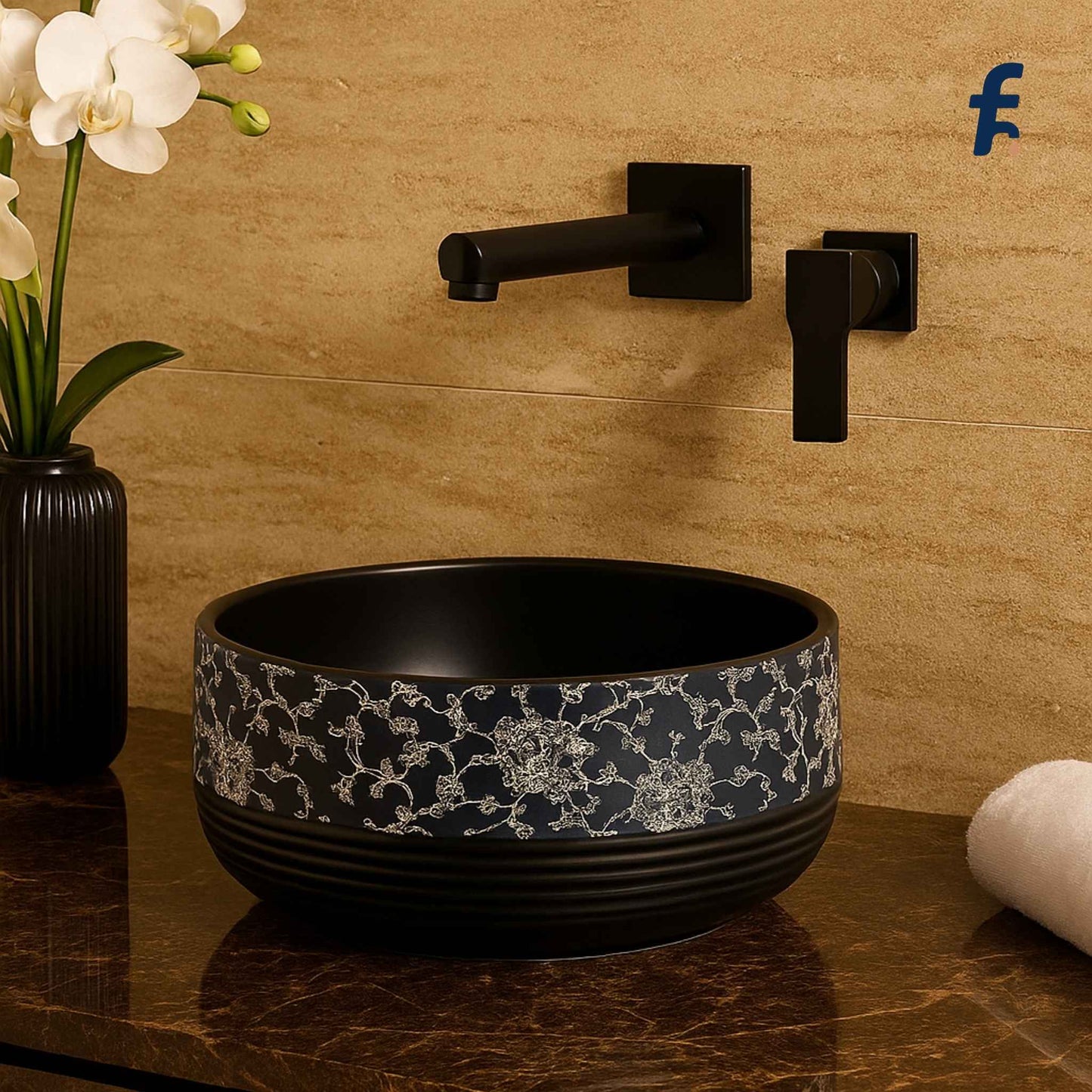 Side angle of EQTT-515 designer washbasin showcasing matte black interior and silver floral border, styled on a premium marble countertop.