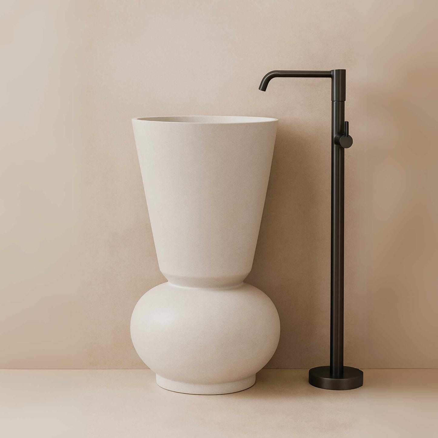 Matt white colour pedestal washbasin perfect for living rooms side front angle image.