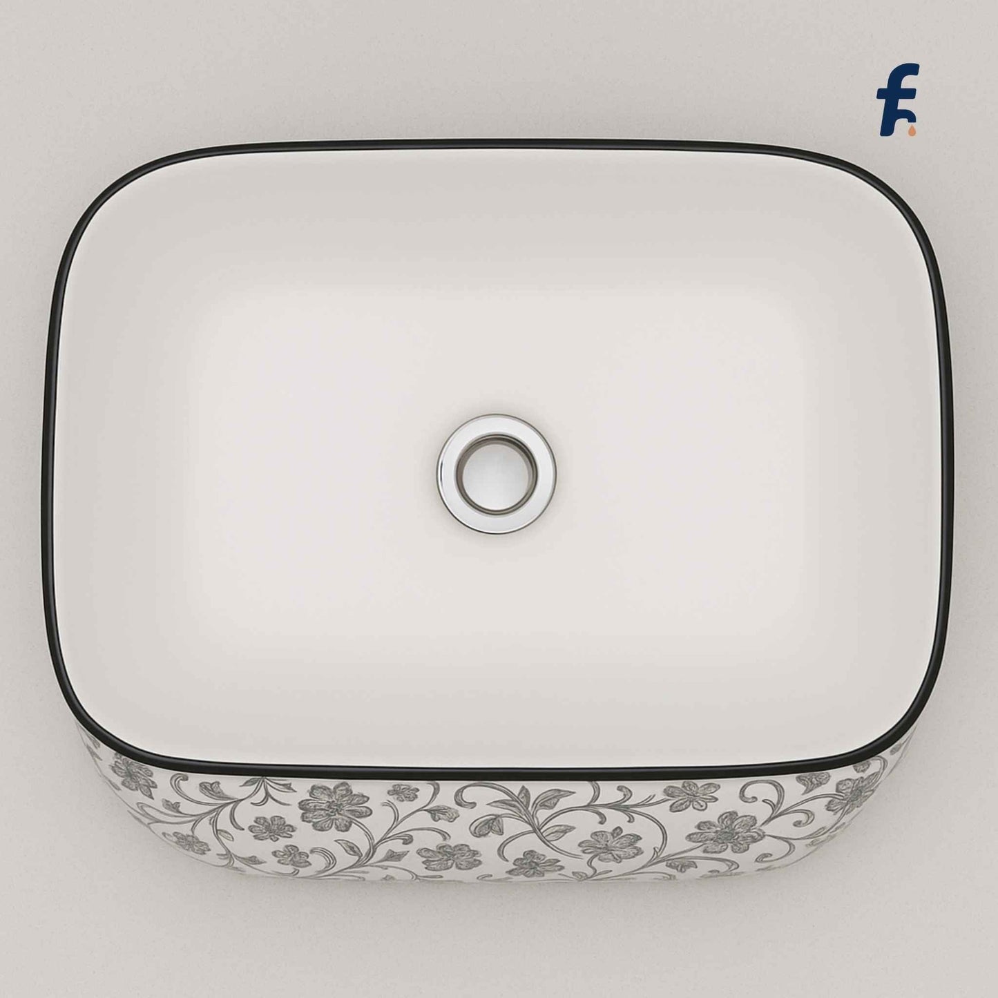 Square ceramic sink with floral pattern on a light gray background