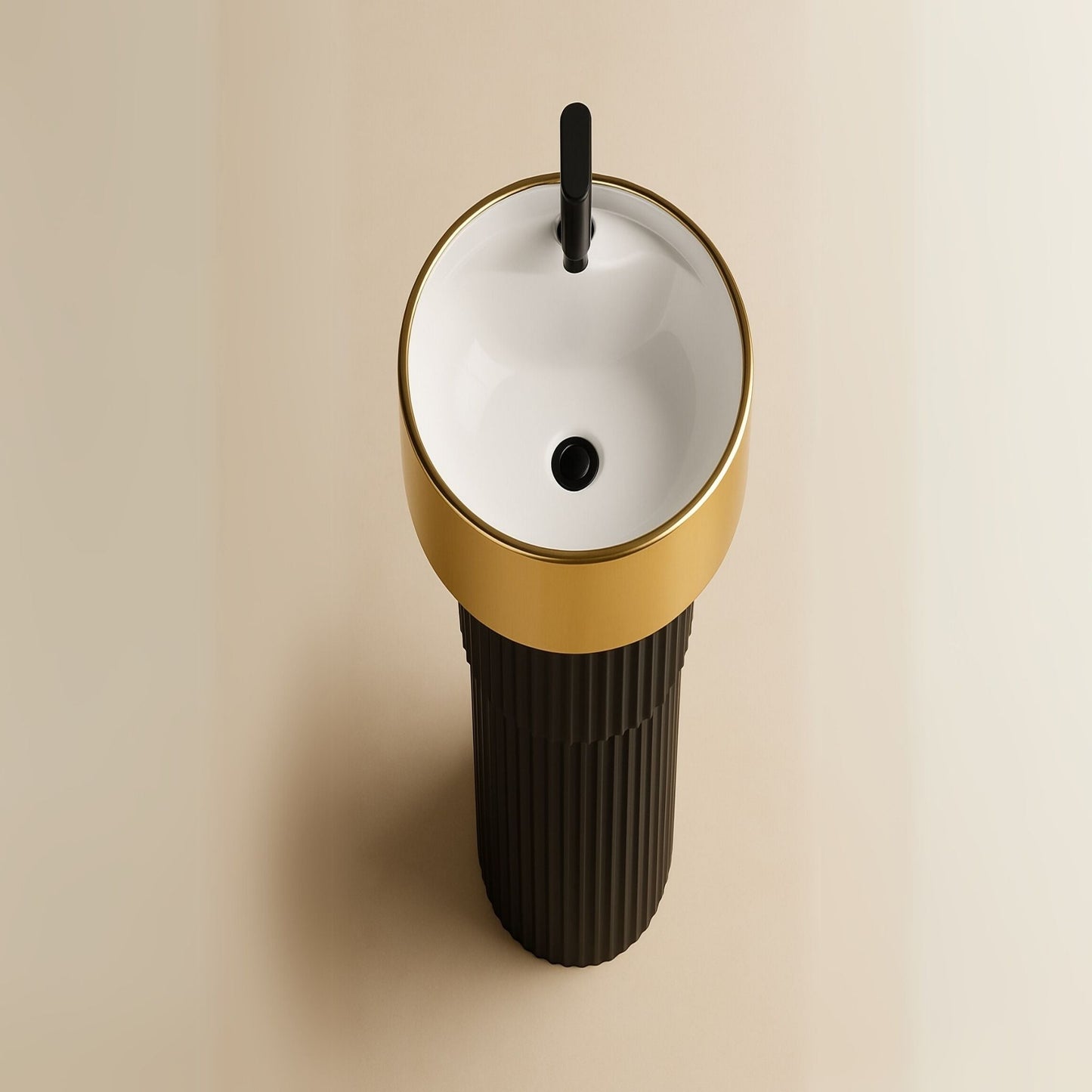 Top angle of round black and gold pedestal basin