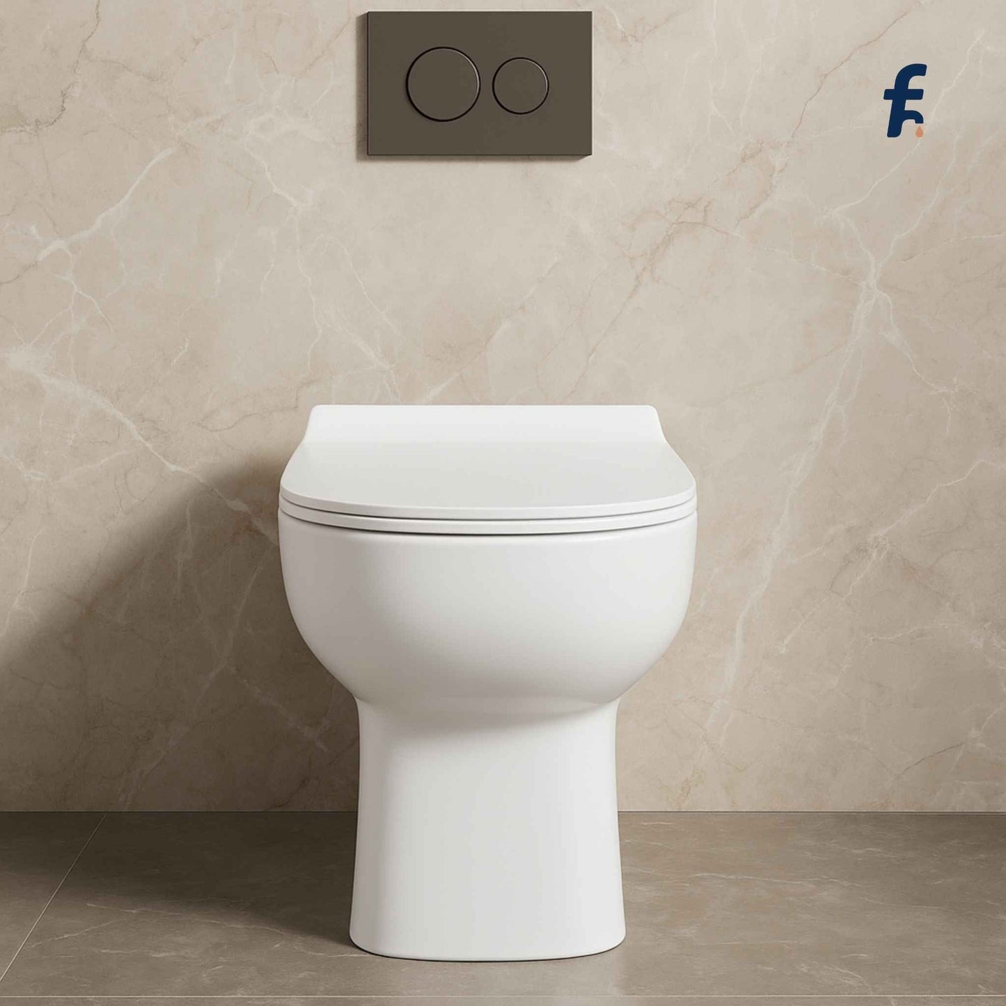 White toilet against a beige tiled wall with a dark gray flush plate.