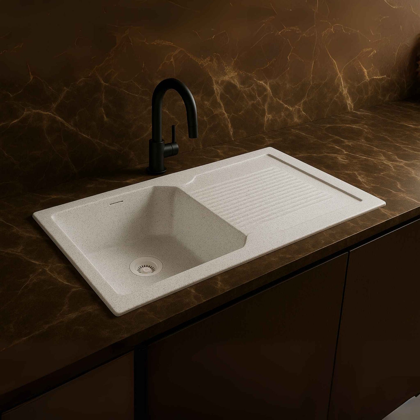 Side profile of luxury Alaska granite kitchen sink placed in satvario marble kitchen with designer pull-out faucet
