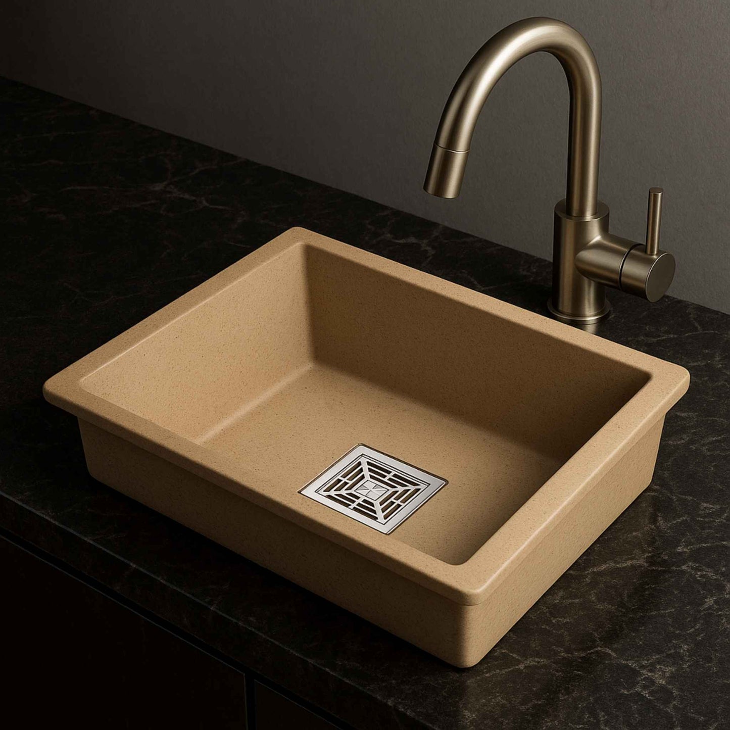 Side angle of almond granite kitchen sink placed on luxurious marble countertop