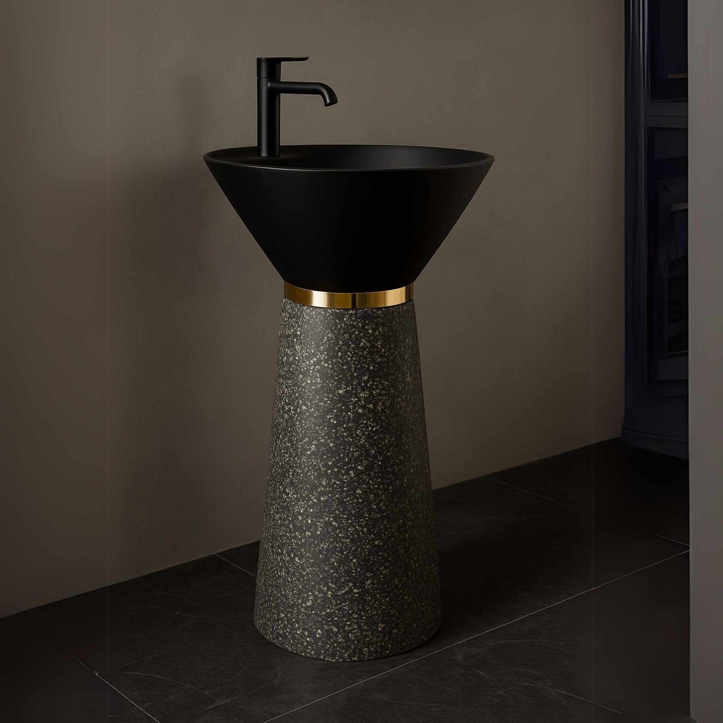 Black cone basin with gold ring and granite base in luxury bathroom