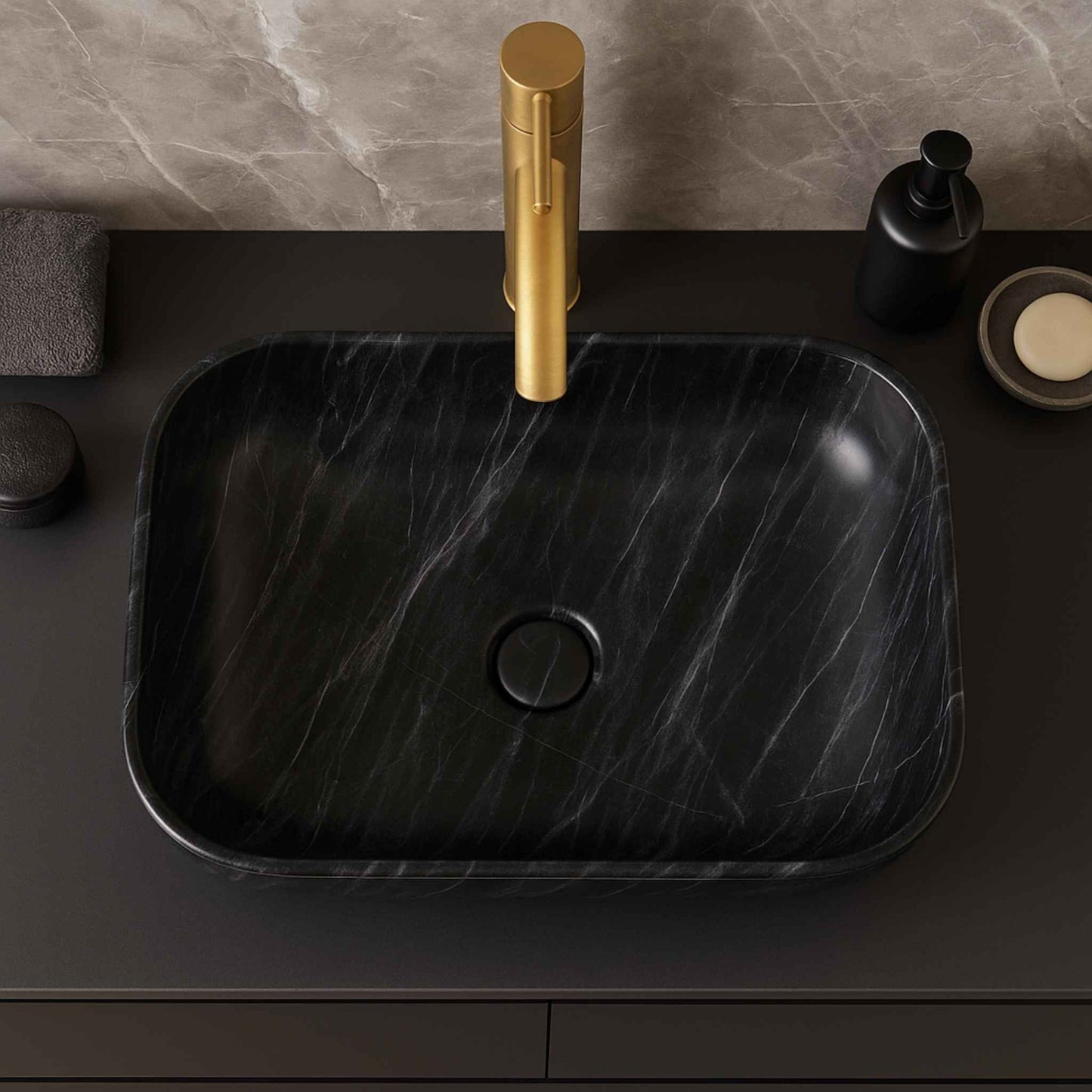 Top angle of designer black ceramic basin with white marble texture placed on modern bathroom vanity