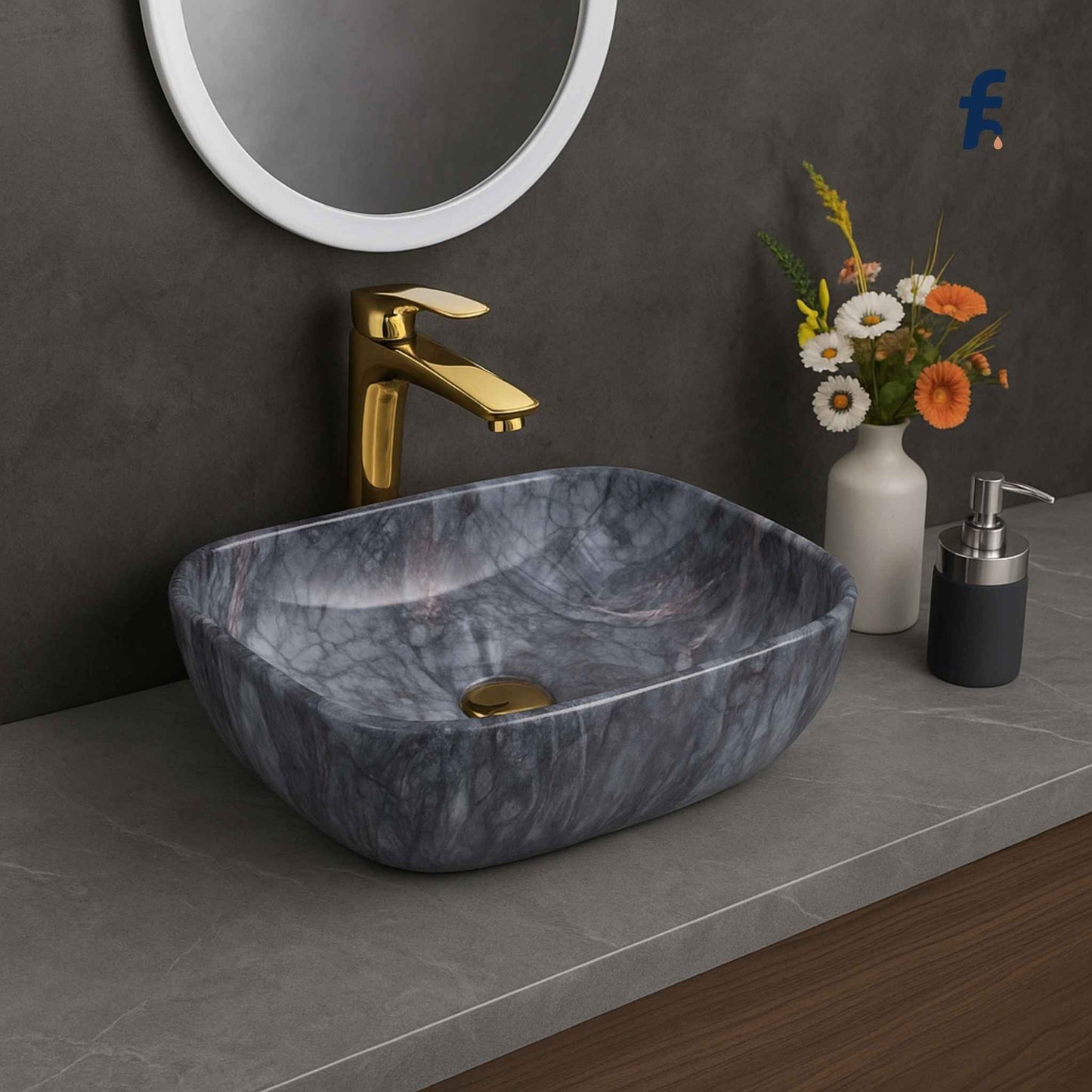 Bathroom vanity with blue marble sink, gold faucet, and decorative elements.