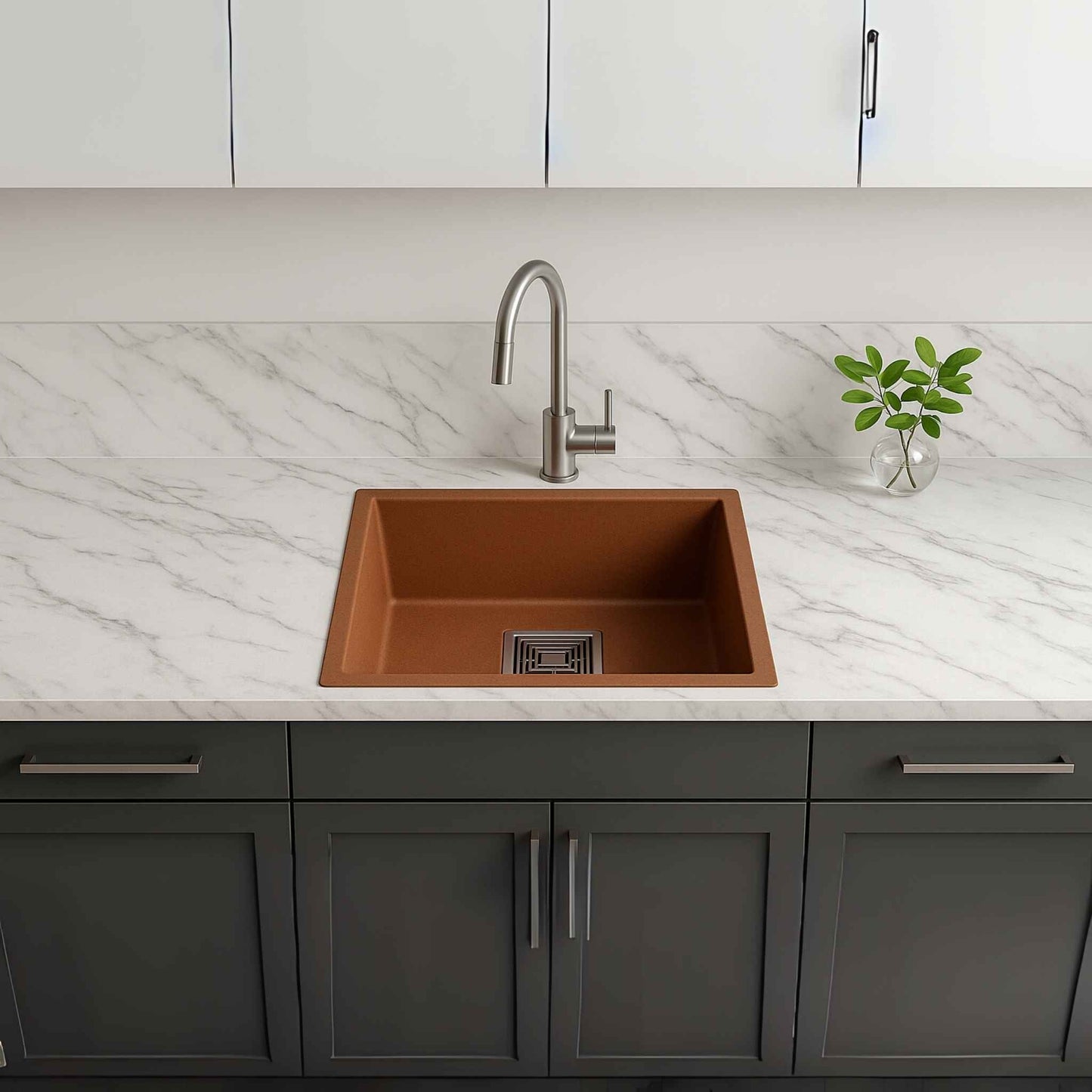 Brown kitchen sink showing complete waste coupling and drain pipe set included