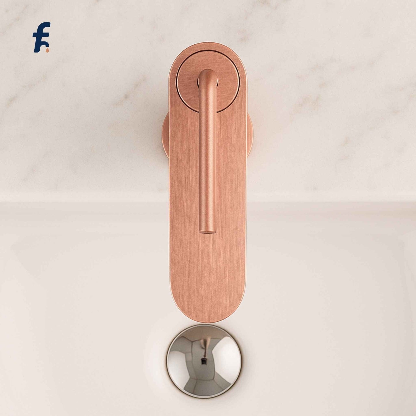Rose gold door handle on a white marble background, Top angle view of brushed rose gold faucet on black Italian marble vanity