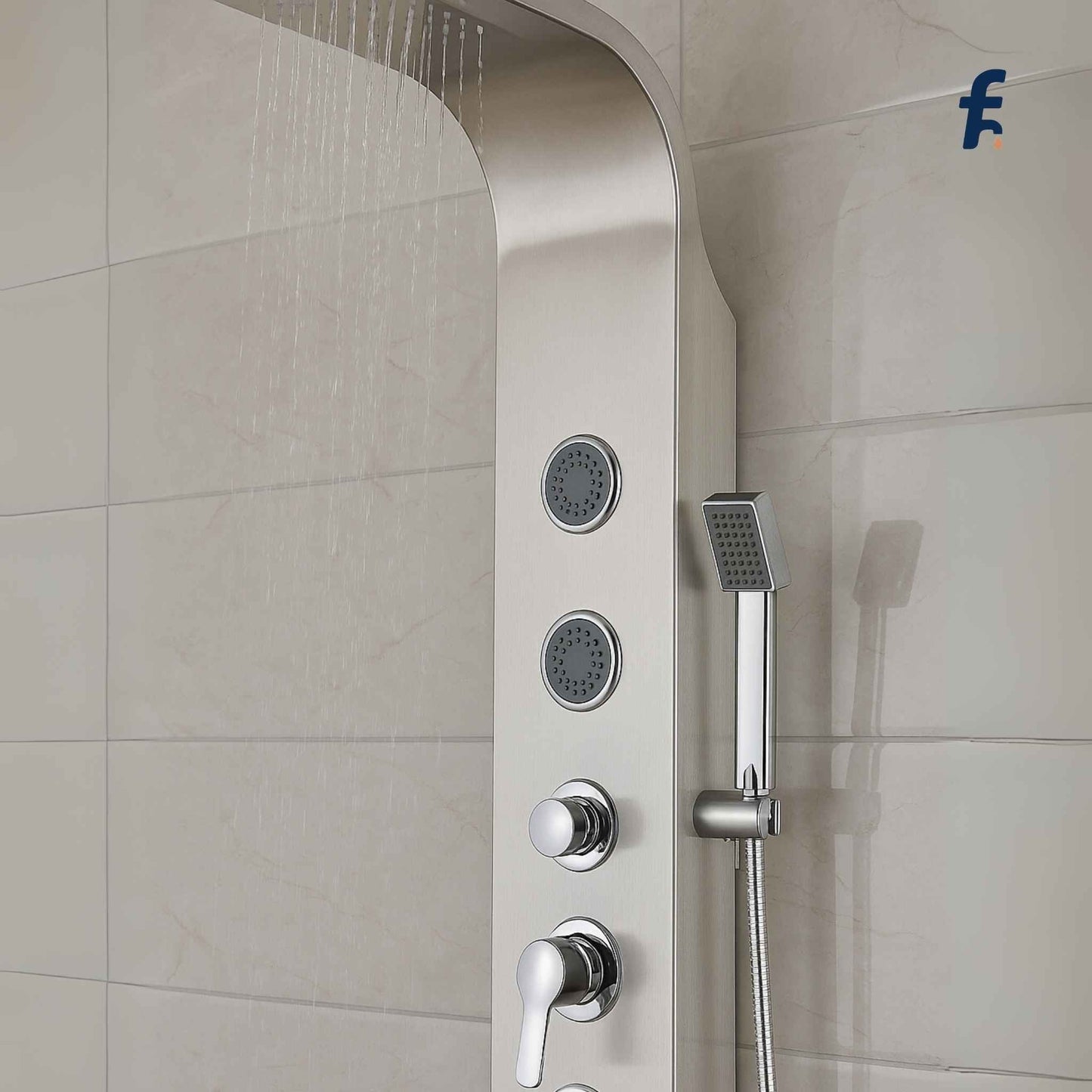 Shower panel with multiple control knobs and a handheld shower head mounted on a tiled wall. close-up view of luxury chrome curved shower panel with rainfall head and massage jets