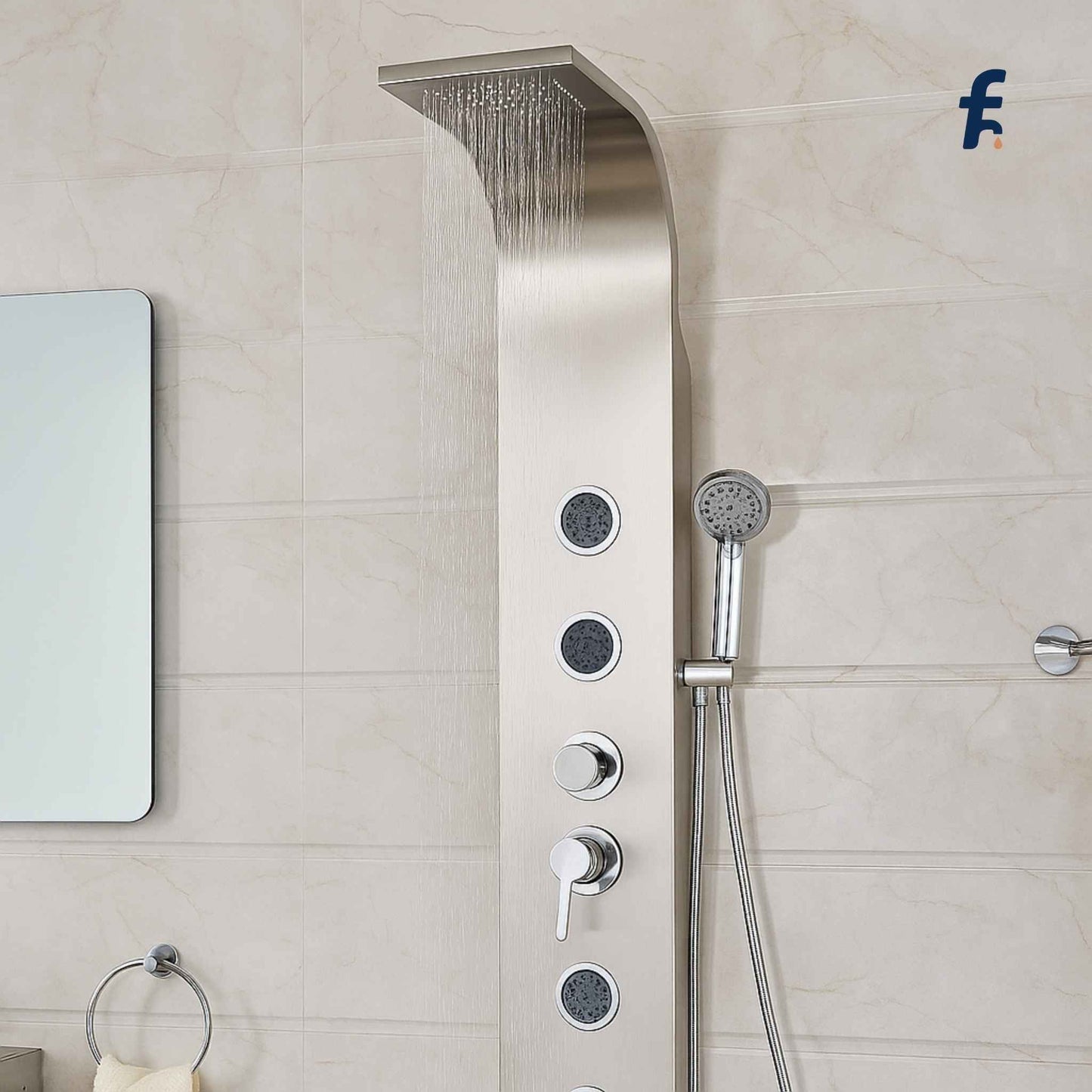 Shower panel with rainfall shower head and handheld shower on tiled bathroom wall. Top view of modern chrome shower panel installed in a white Italian marble bathroom