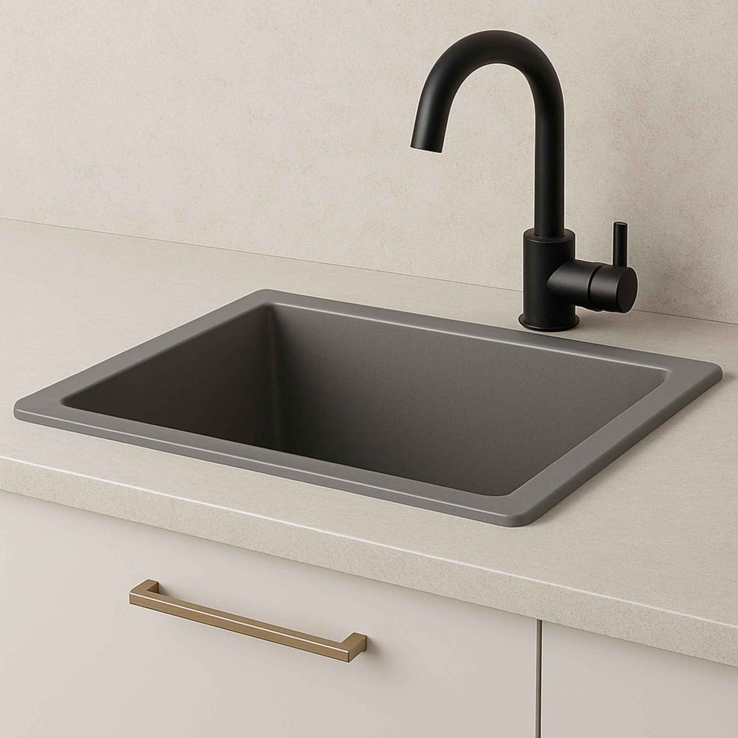 Grey metallic sink in luxury kitchen with quartz counter and matte black faucet