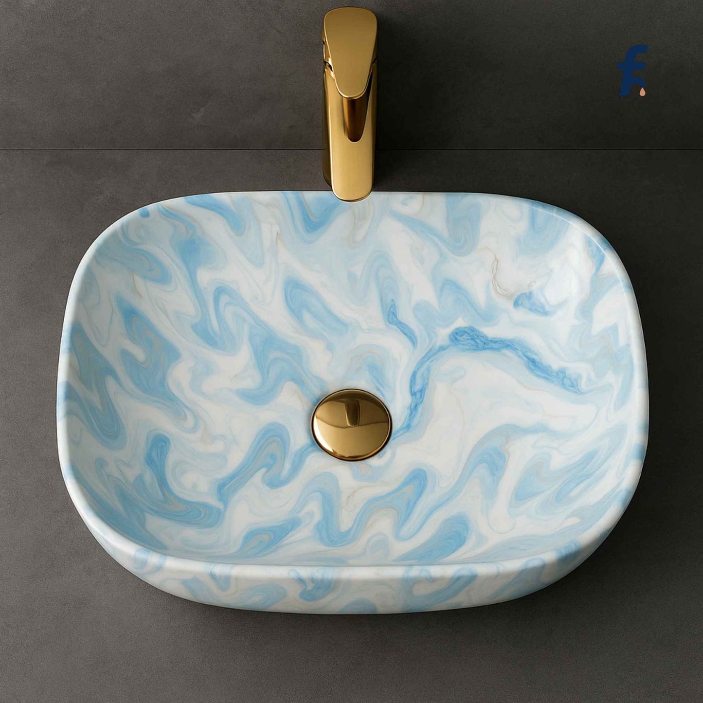 Marble-patterned sink with gold faucet and drain on a dark background, Top view of ceramic blue marble wash basin with golden coupling