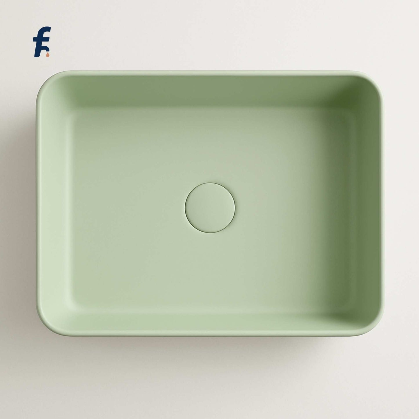 Green rectangular sink on a light grey background, Top view of mint green bathroom basin for luxury interiors