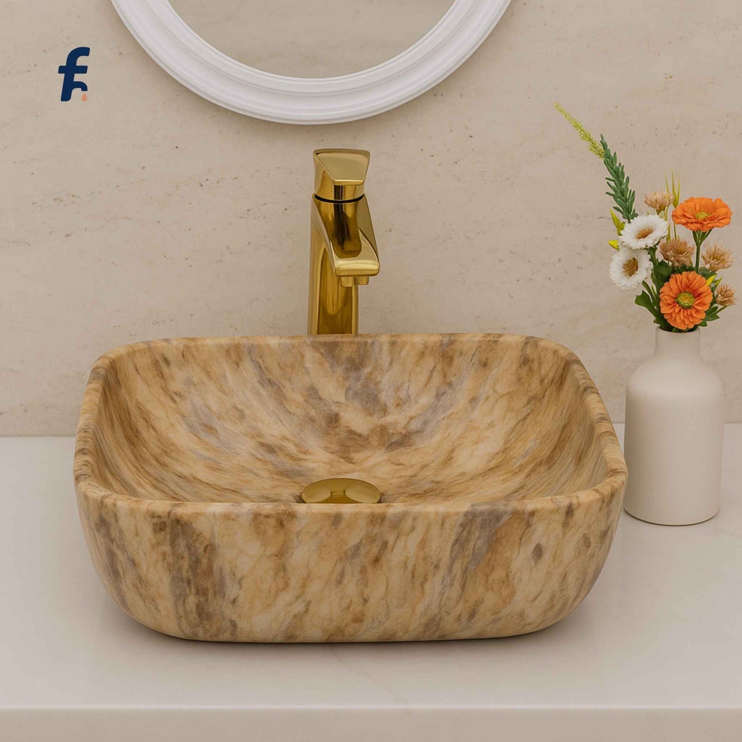 Marble sink with gold faucet in a bathroom setting, Front angle view of marble print wash basin on white counter