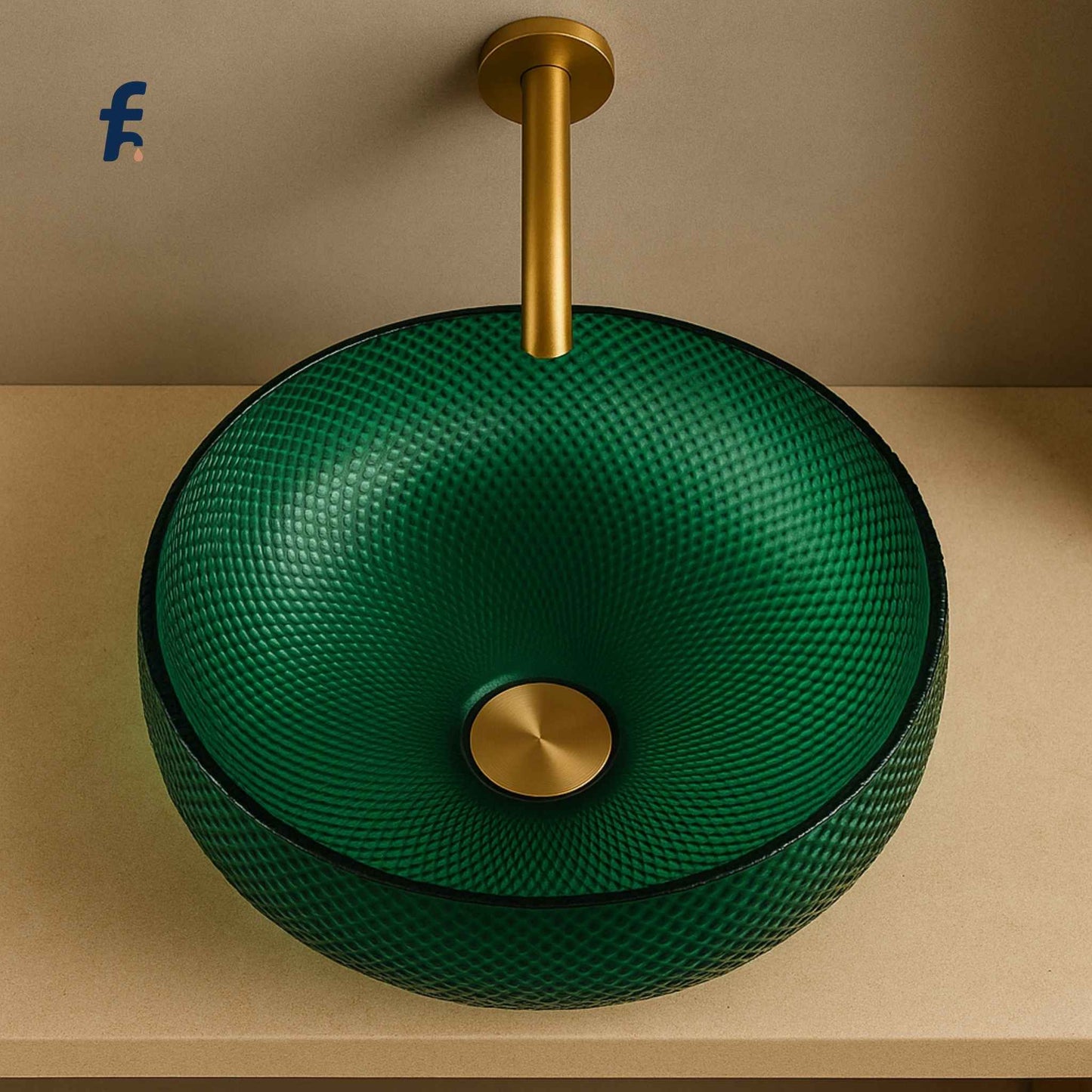 Green textured sink with gold faucet on a beige surface