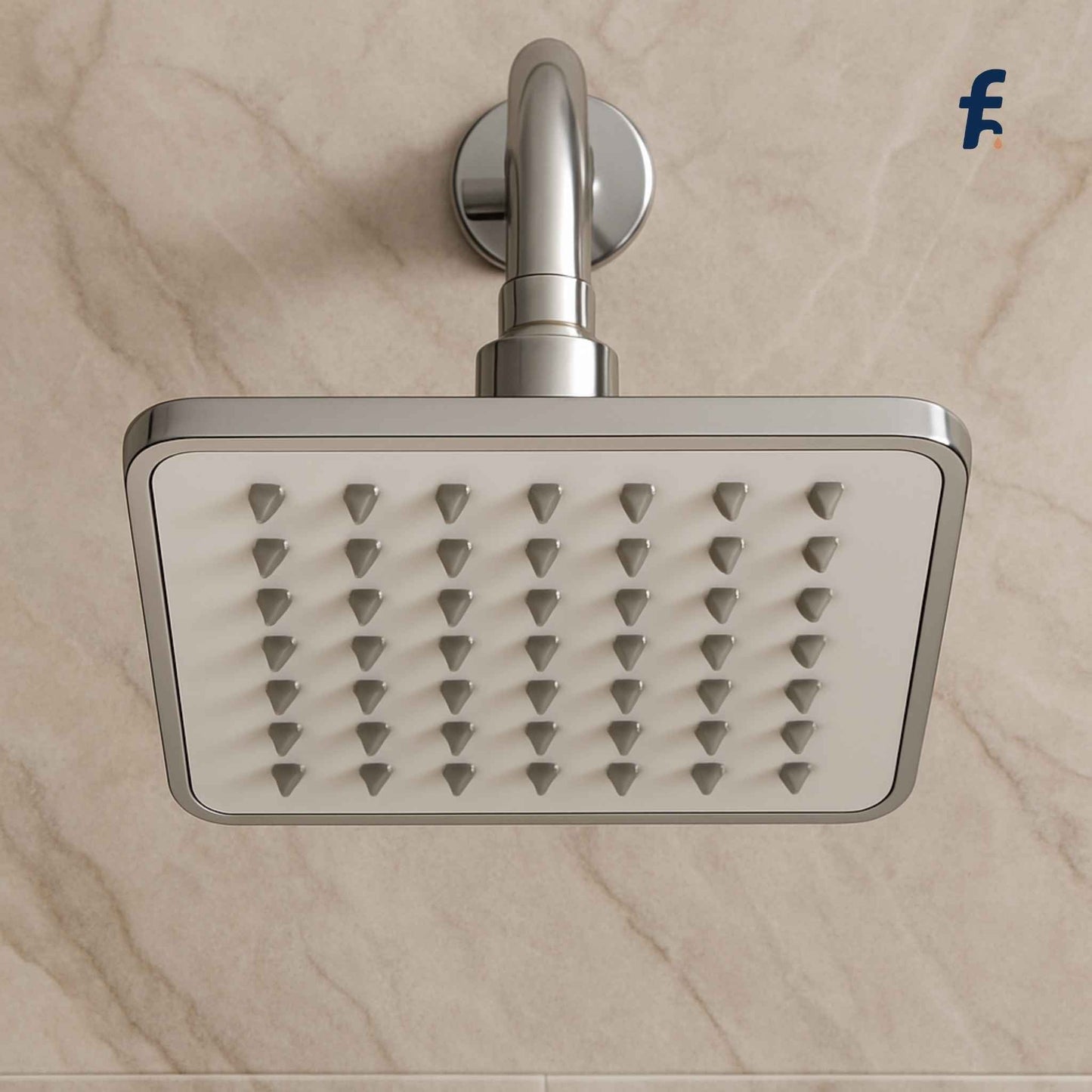 Metallic shower head on a marble wall background, Front top view of rectangular chrome sandwich shower head mounted on marble bathroom wall