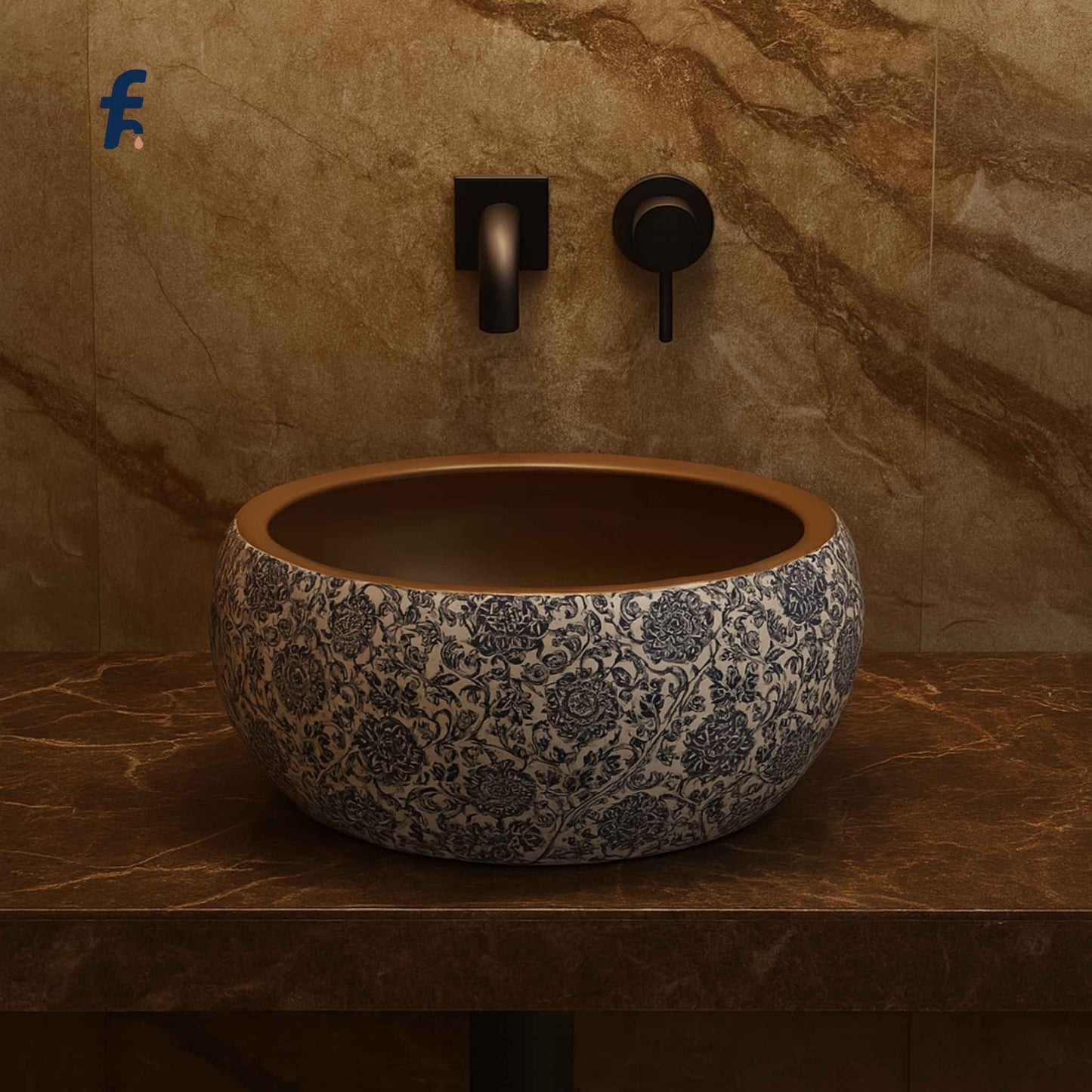 Decorative ceramic sink with floral patterns on a marble countertop and wall.