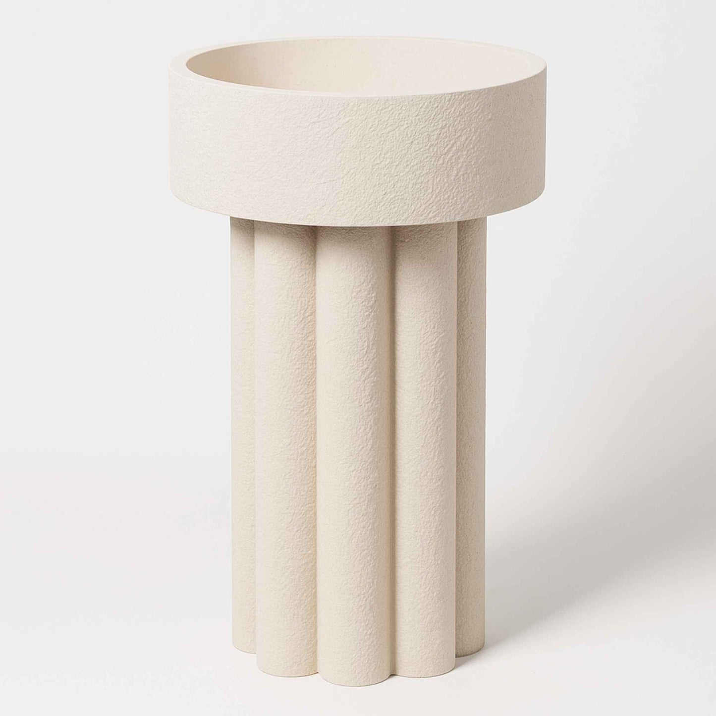 Front view of elegant textured stone pedestal washbasin – 825mm tall