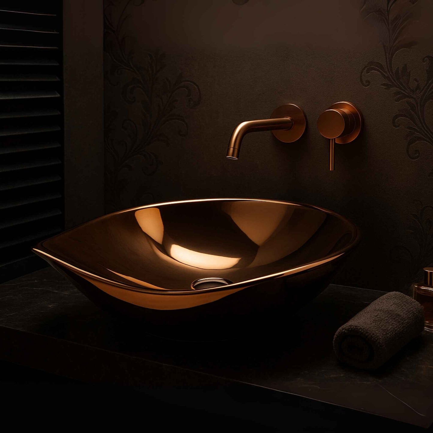Front angle of glossy rose gold leaf-shaped wash basin EQTT-464 on black vanity
