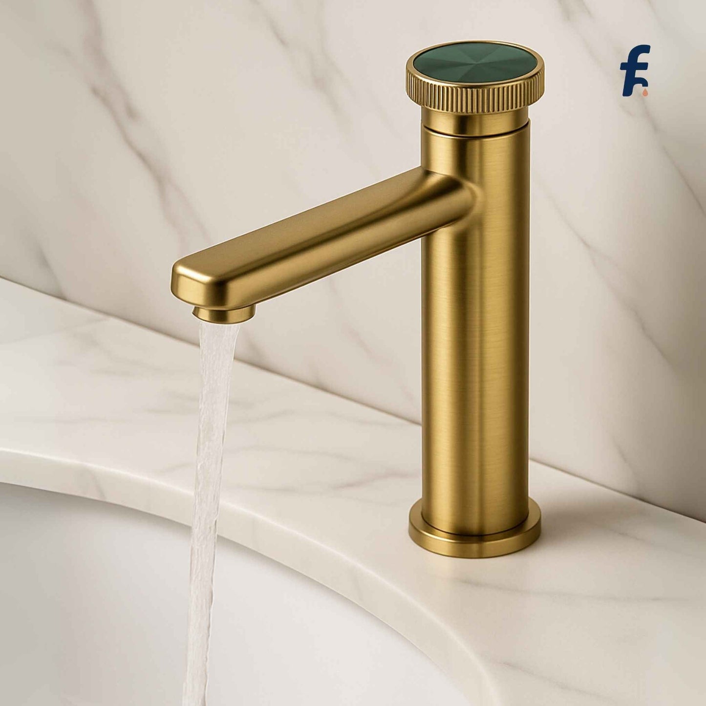Gold faucet on a white marble surface with water flowing.