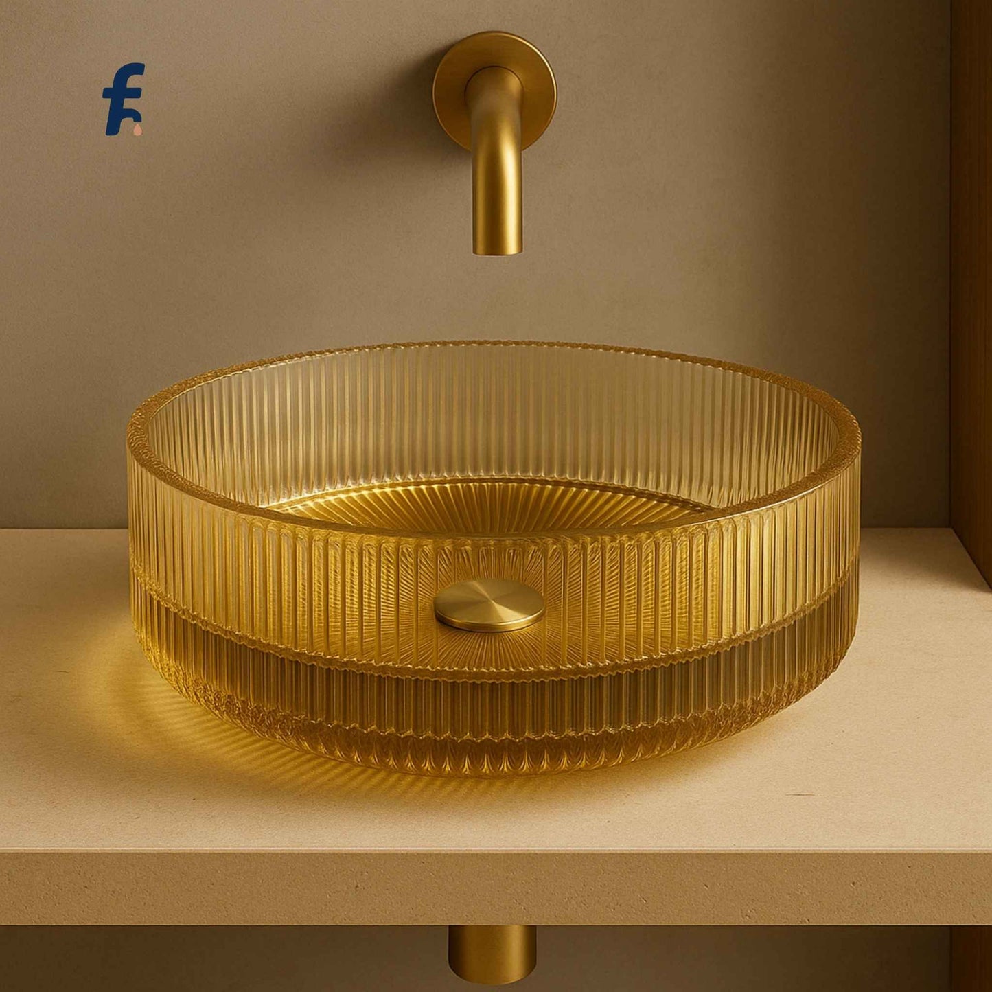 Gold glass textured washbasin with matching faucet on a beige background
