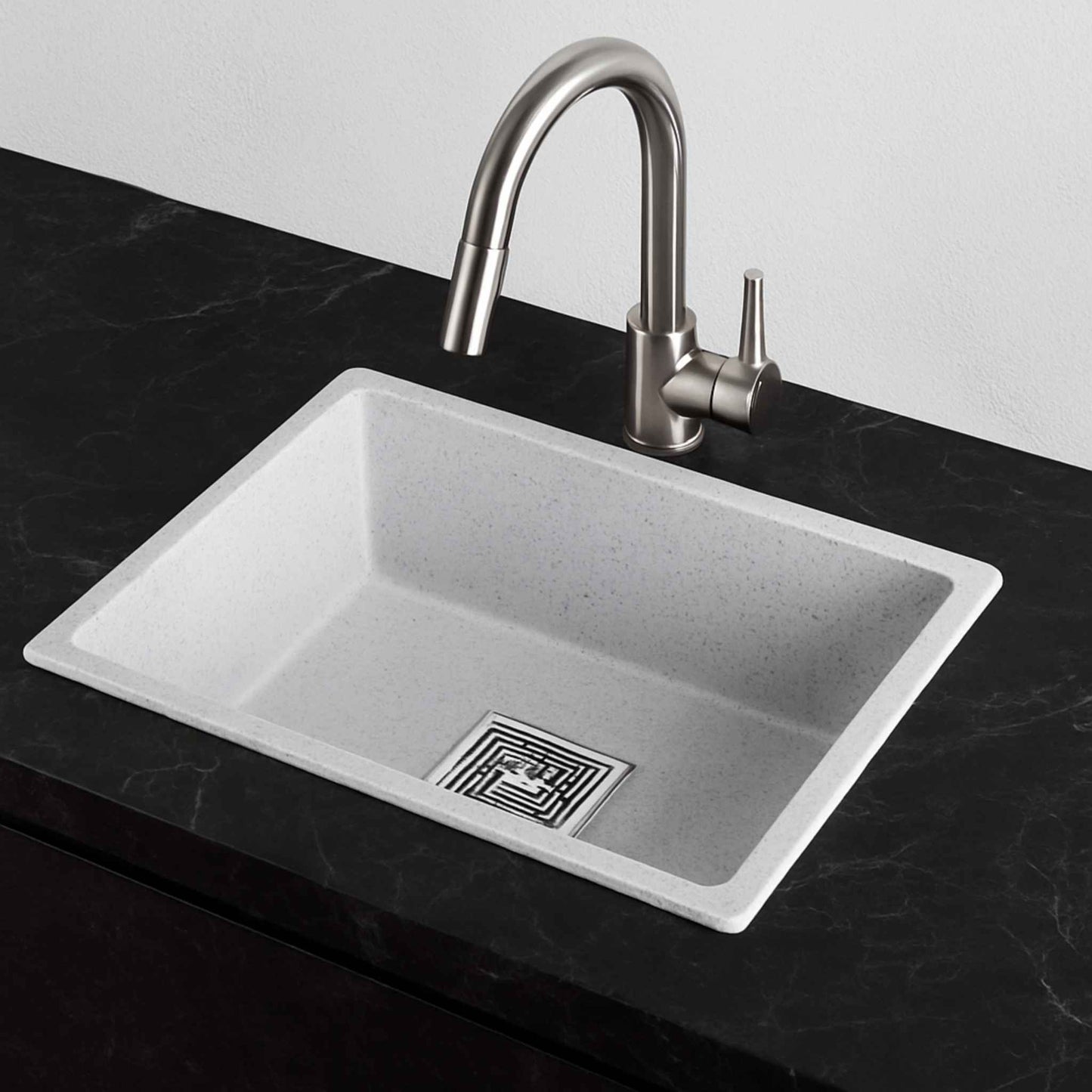 Side angle view of white granite kitchen sink with designer faucet – Graniridge Series