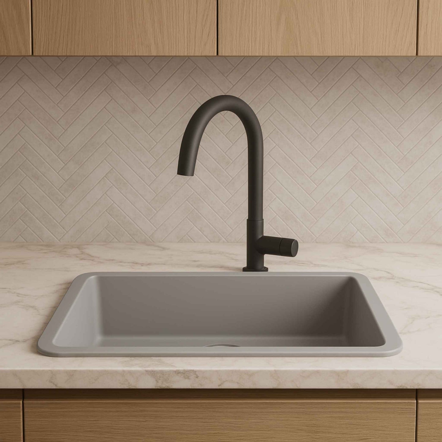 Grey granite kitchen sink with luxury faucet front angle