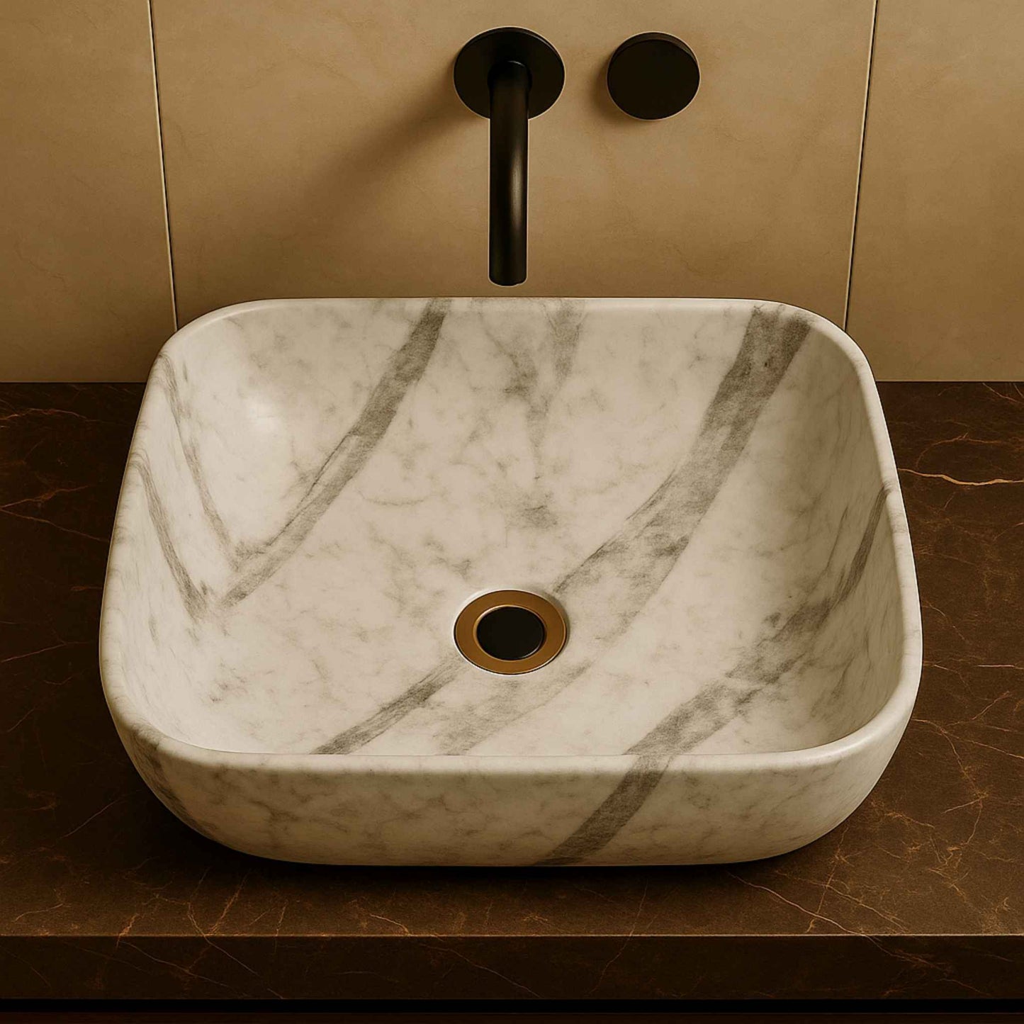 Top view of a rectangular grey marble countertop wash basin with smooth edges and natural veining, styled with a matte black wall-mounted faucet on a brown marble vanity.