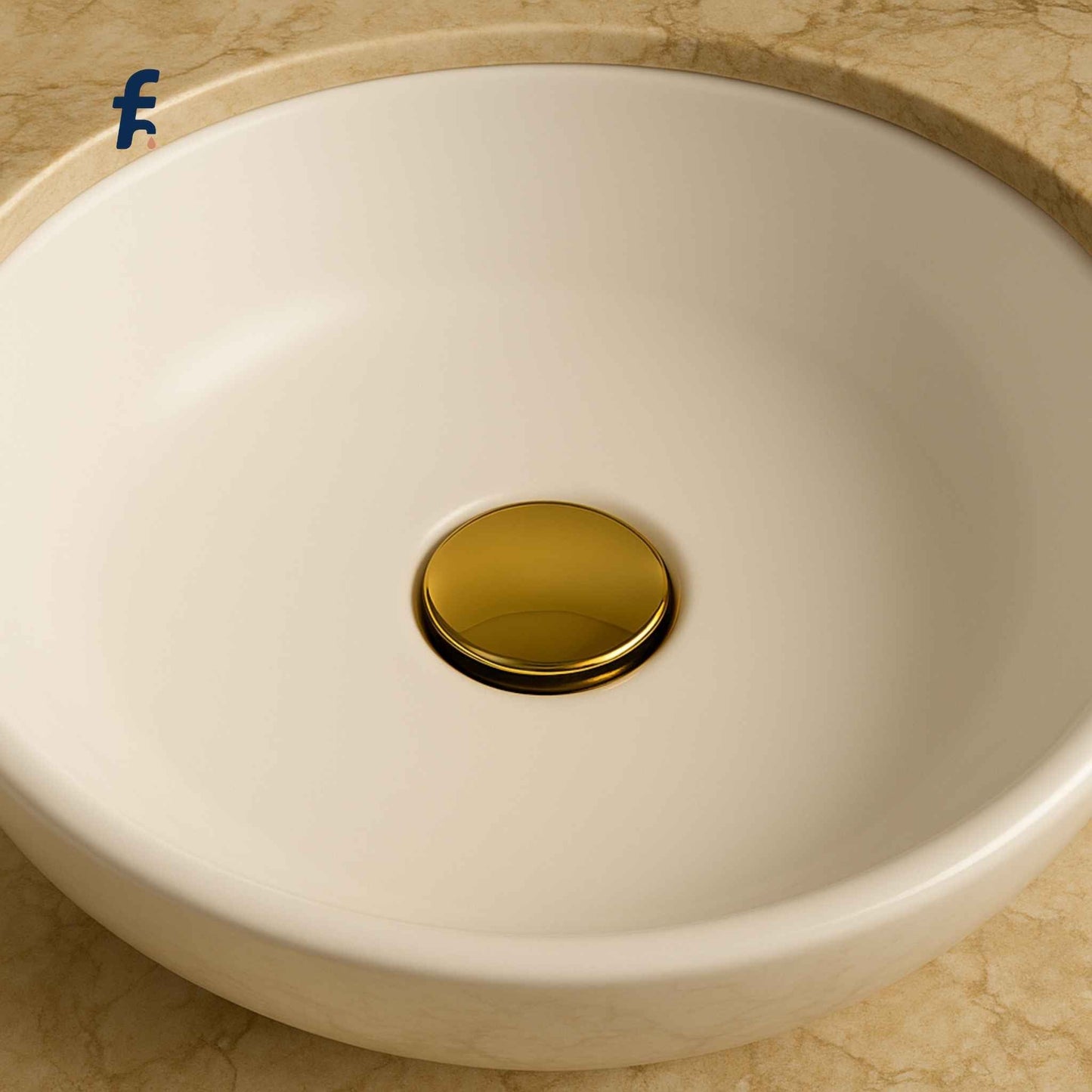 Gold waste coupling installed in a luxury marble washbasin
