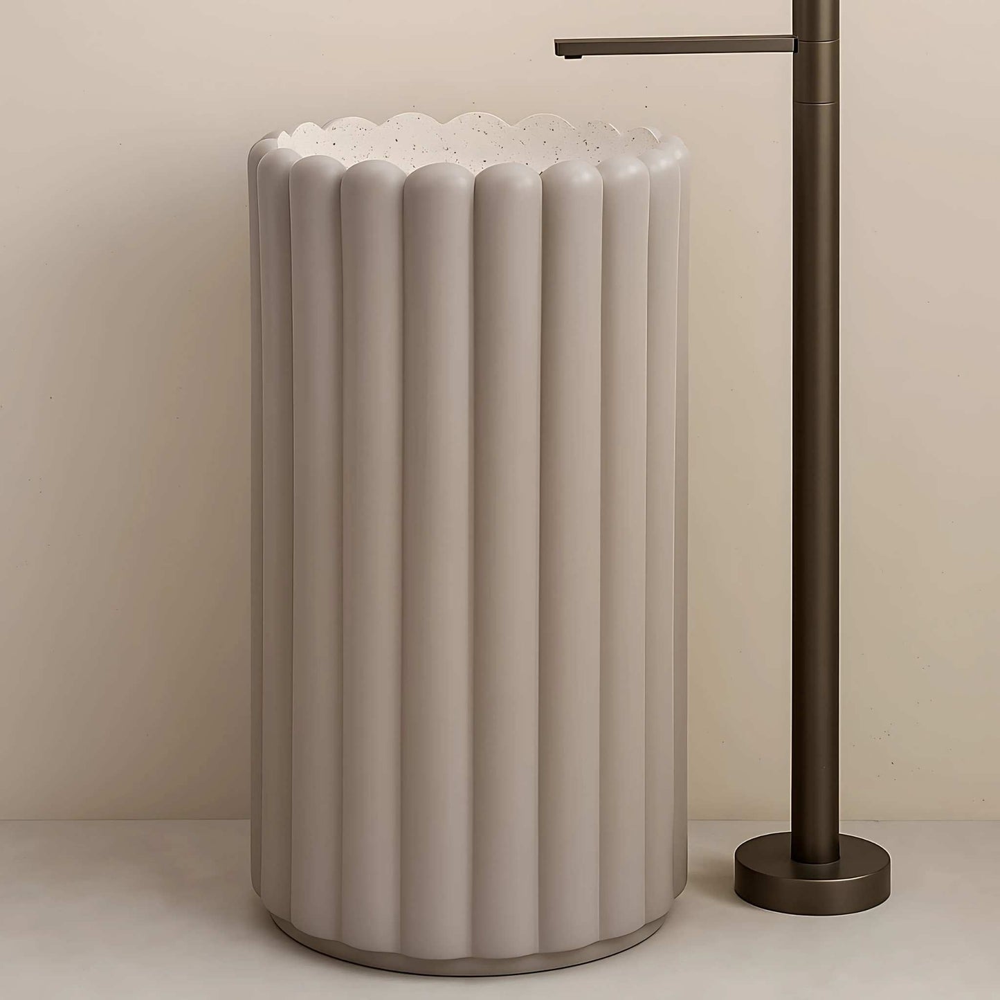 Front view of glossy lilac pedestal washbasin with scalloped rim and wall faucet