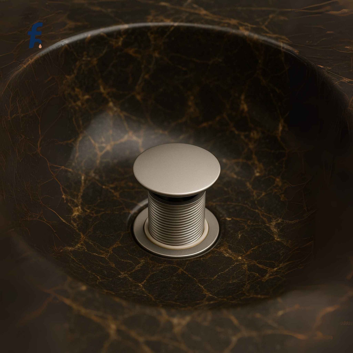 Nickel pop-up coupling in a luxurious marble washbasin
