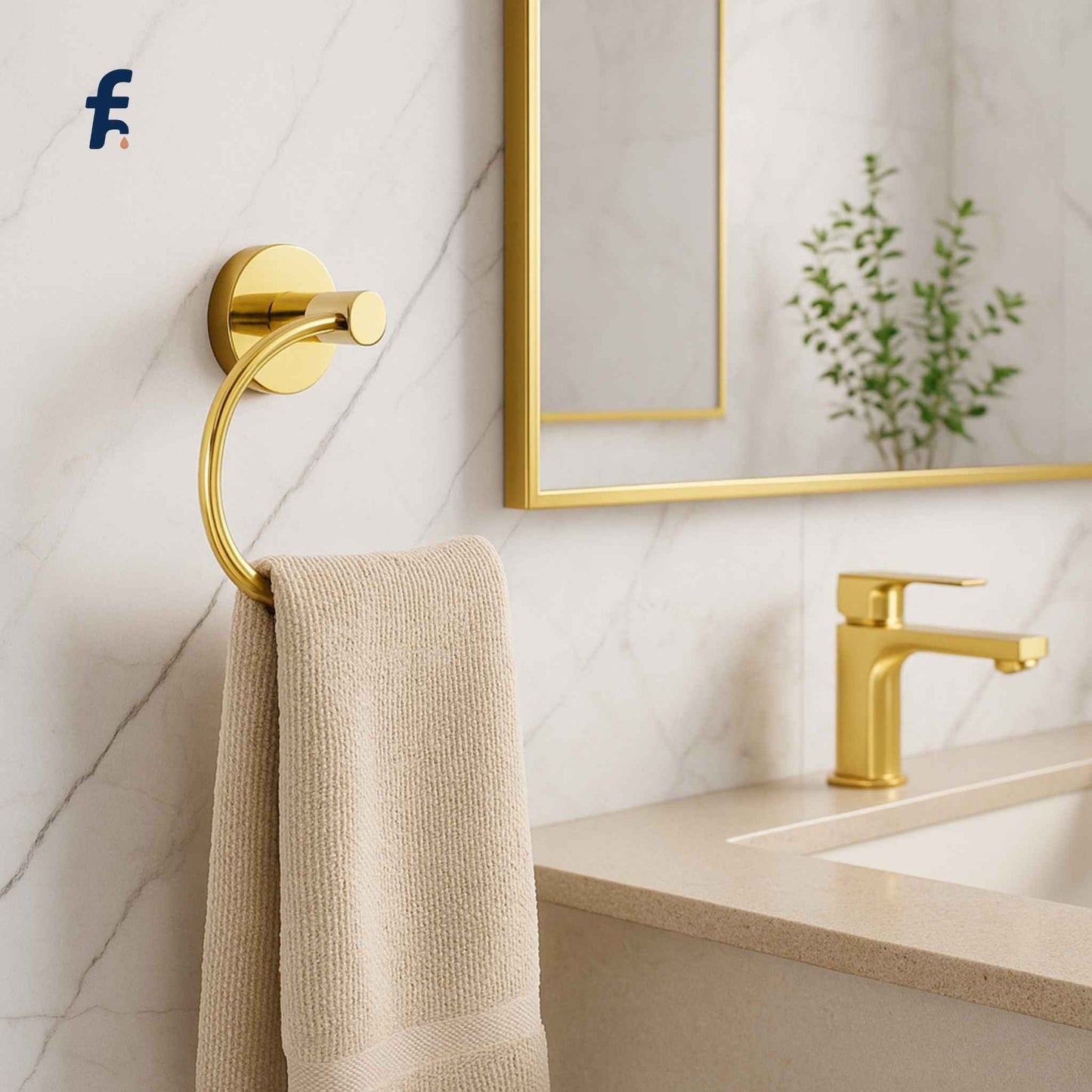 Bathroom with gold towel hook, faucet, and mirror on a marble wall. Premium gold finish napkin ring ideal for modern bathrooms