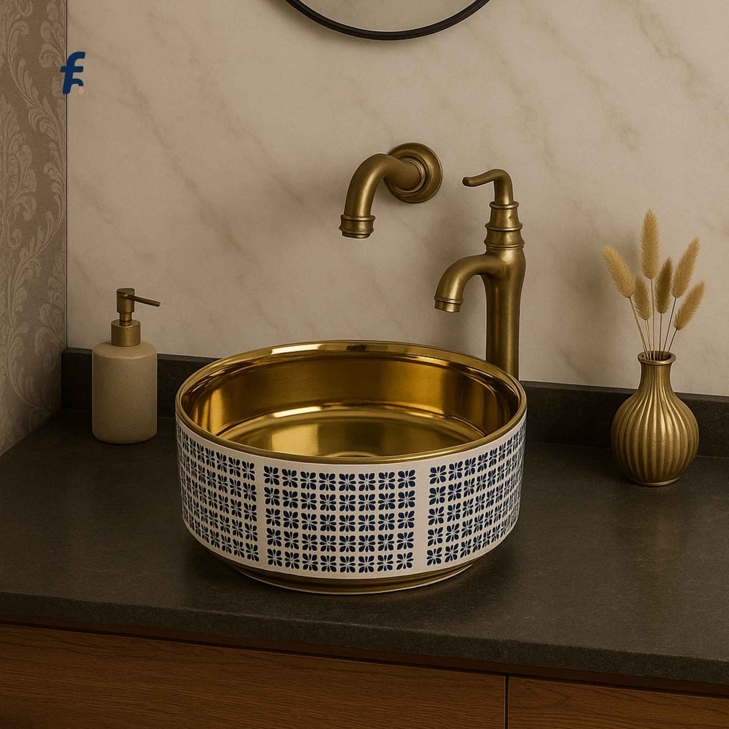 Bathroom sink with gold faucet and decorative elements on a neutral wall.