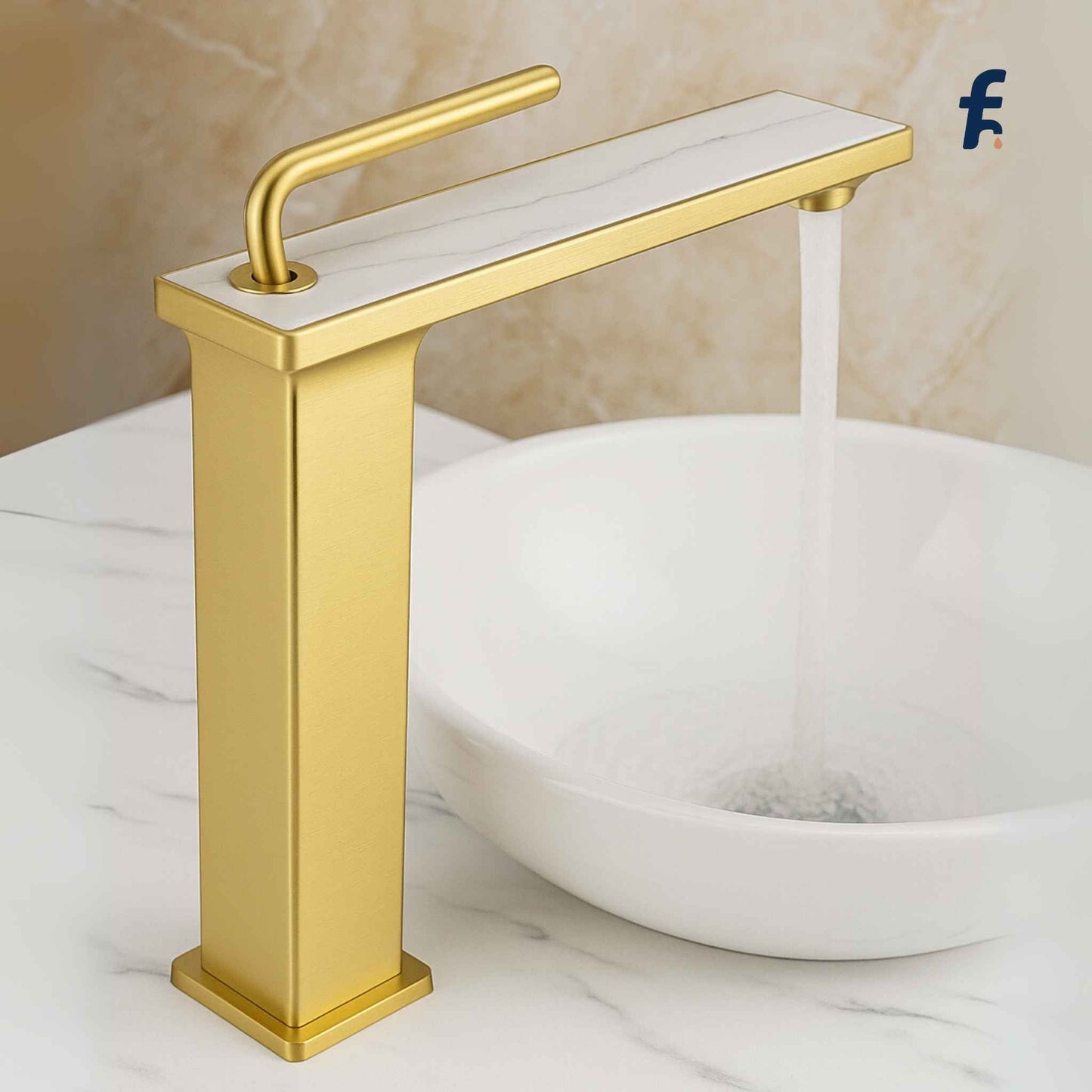 Gold faucet on a white sink with a beige wall background, Top angle view of luxury brass gold faucet with white marble handle.
