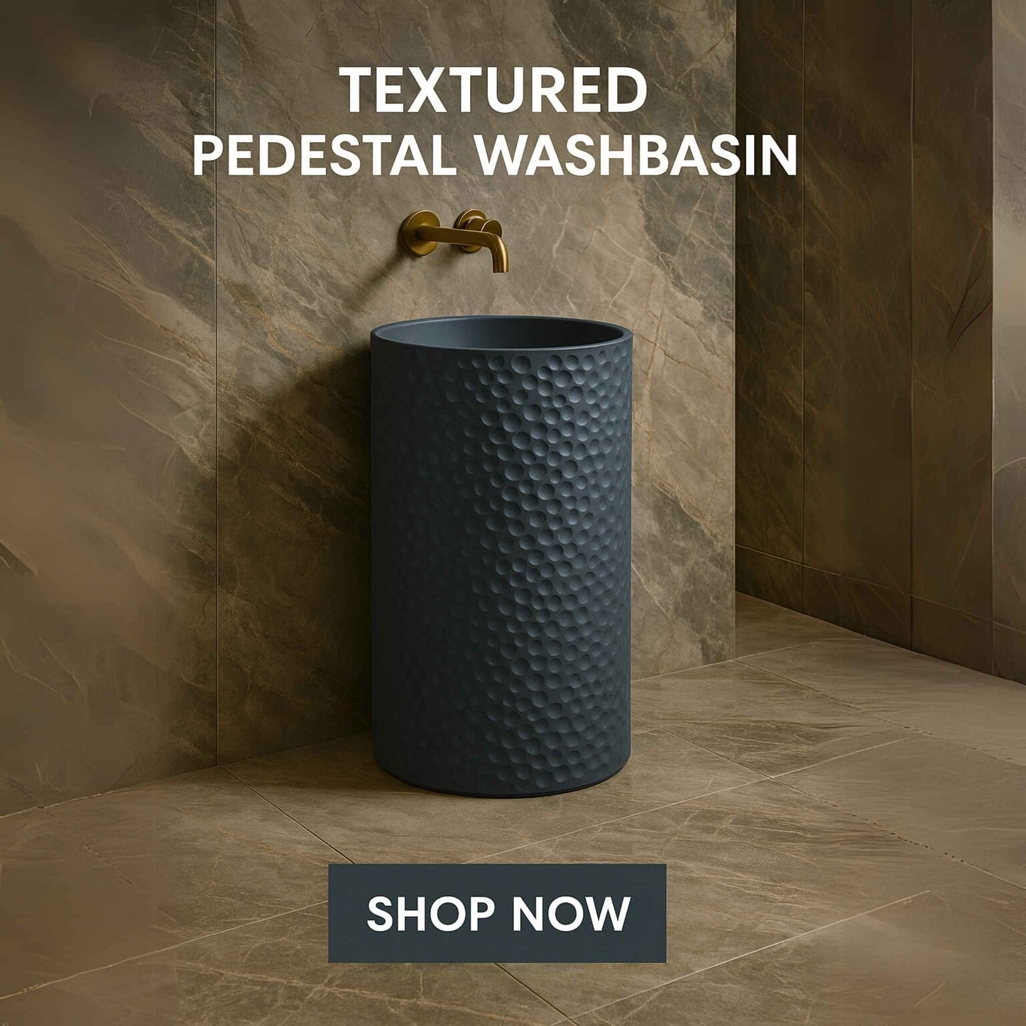 Designer blue pedestal sink with gold faucet and Italian marble tiles in a spacious bathroom