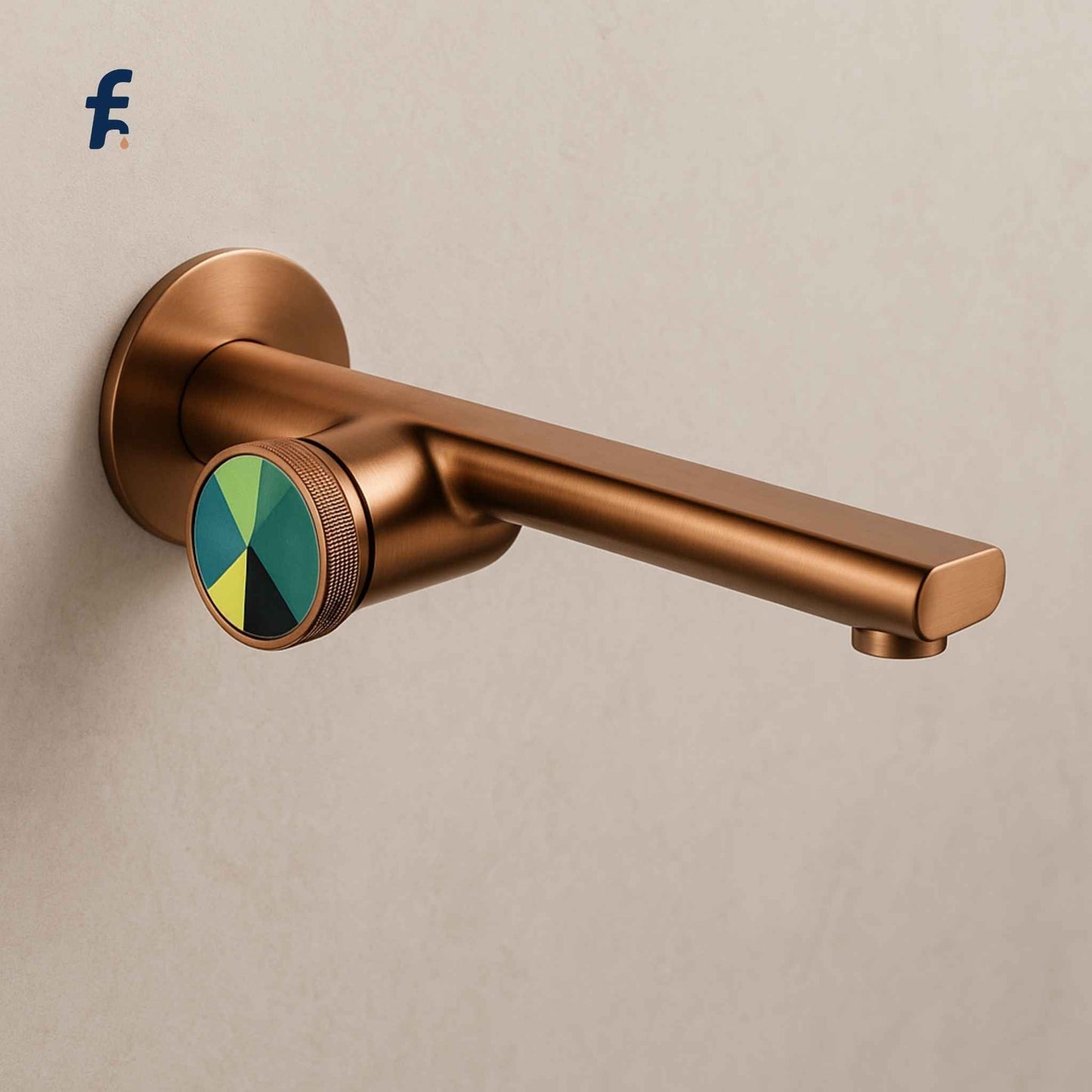 Bronze faucet with a colorful handle on a beige background, Rose gold wall-mounted faucet with geometric knob front view