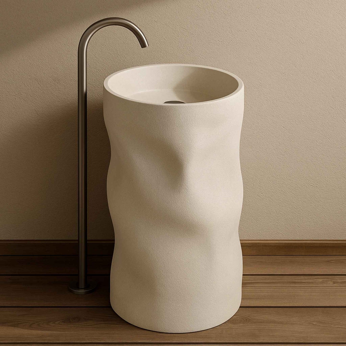 Luxury sculpted pedestal washbasin in matte ivory finish with wall-mounted black faucet placed in front image
