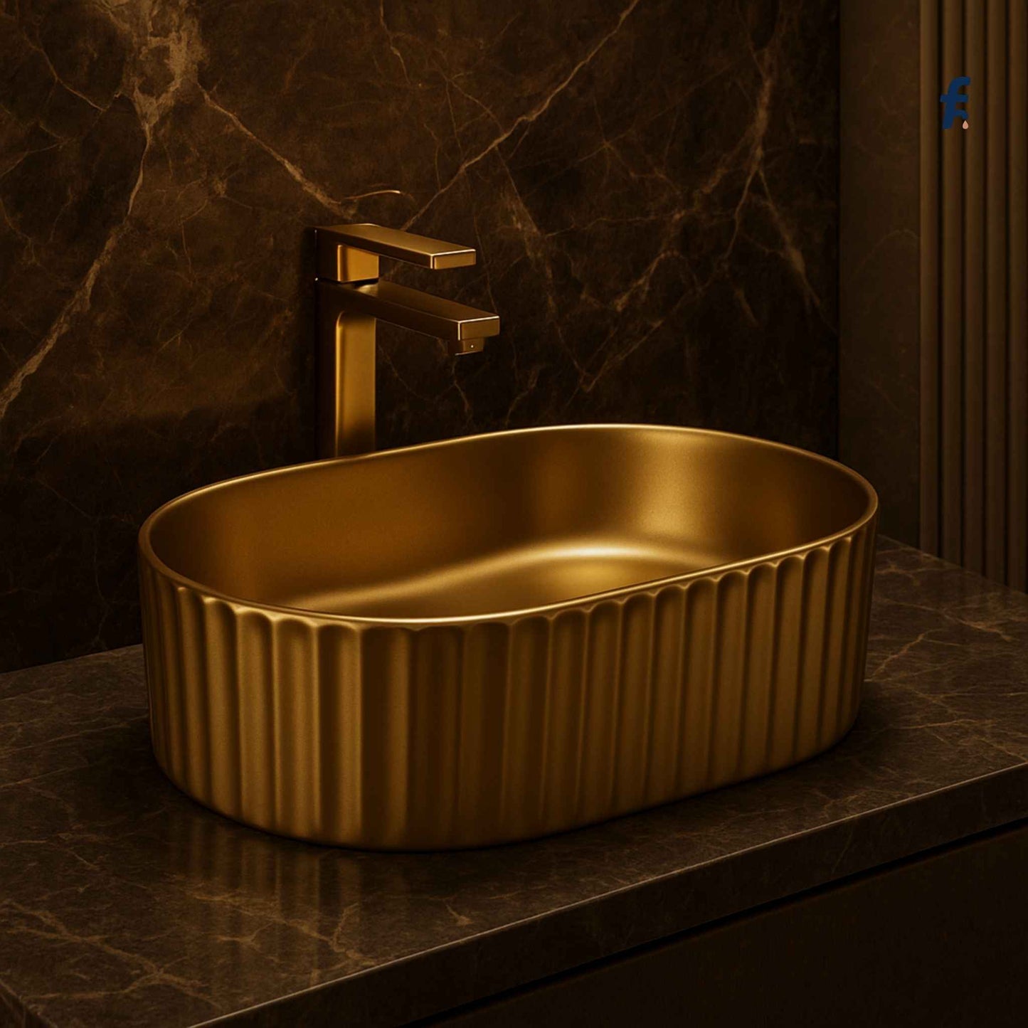 Rose Gold sink and faucet on a marble countertop with a dark marble wall.