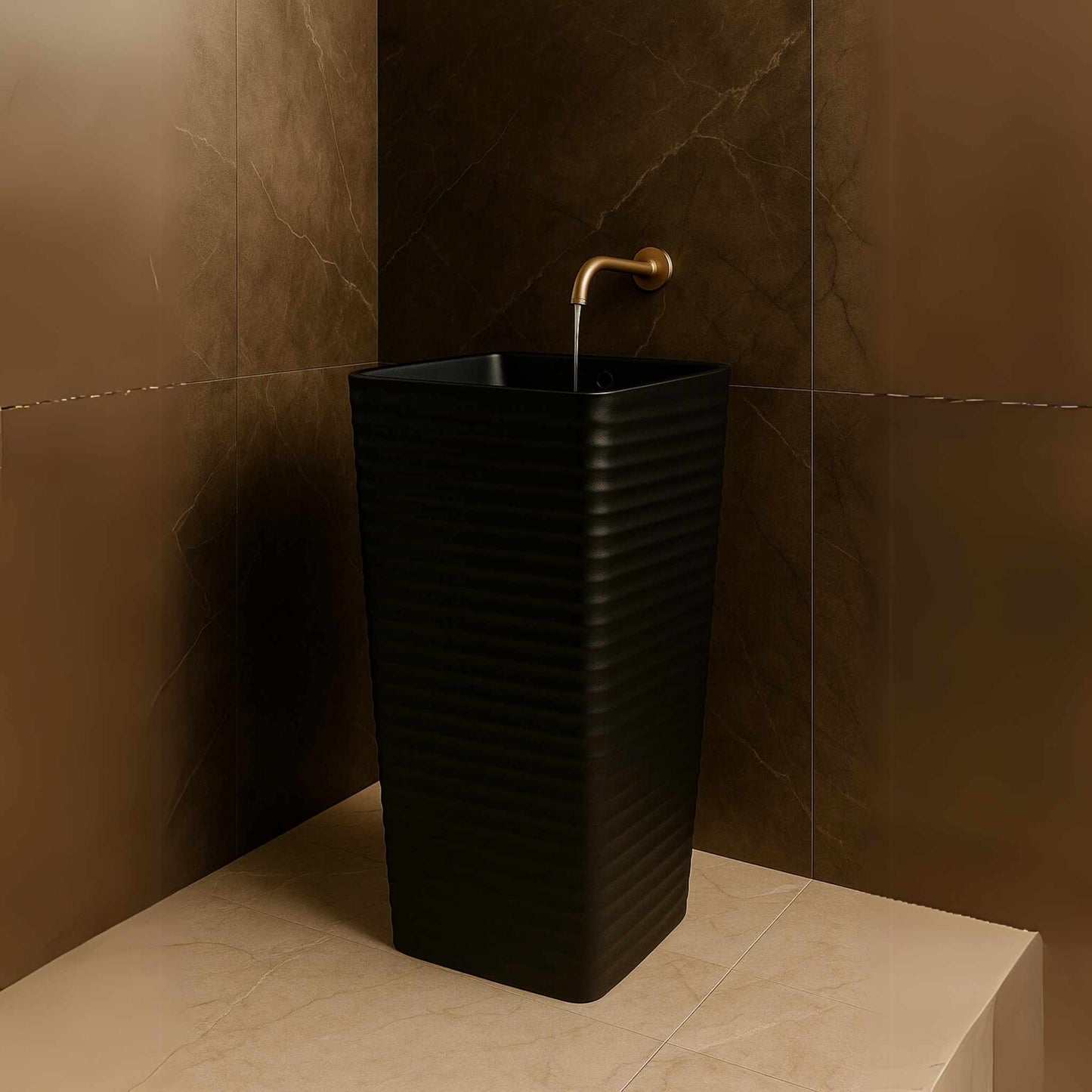 Front view of matte black ripple pedestal washbasin in marble bathroom