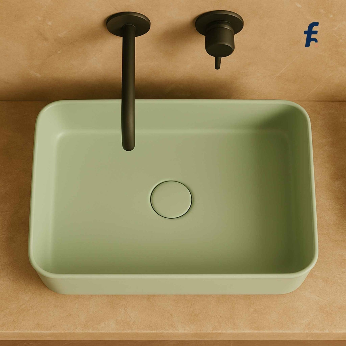 Green rectangular sink with black faucet on a beige background, Mint green ceramic table top wash basin with matte finish.