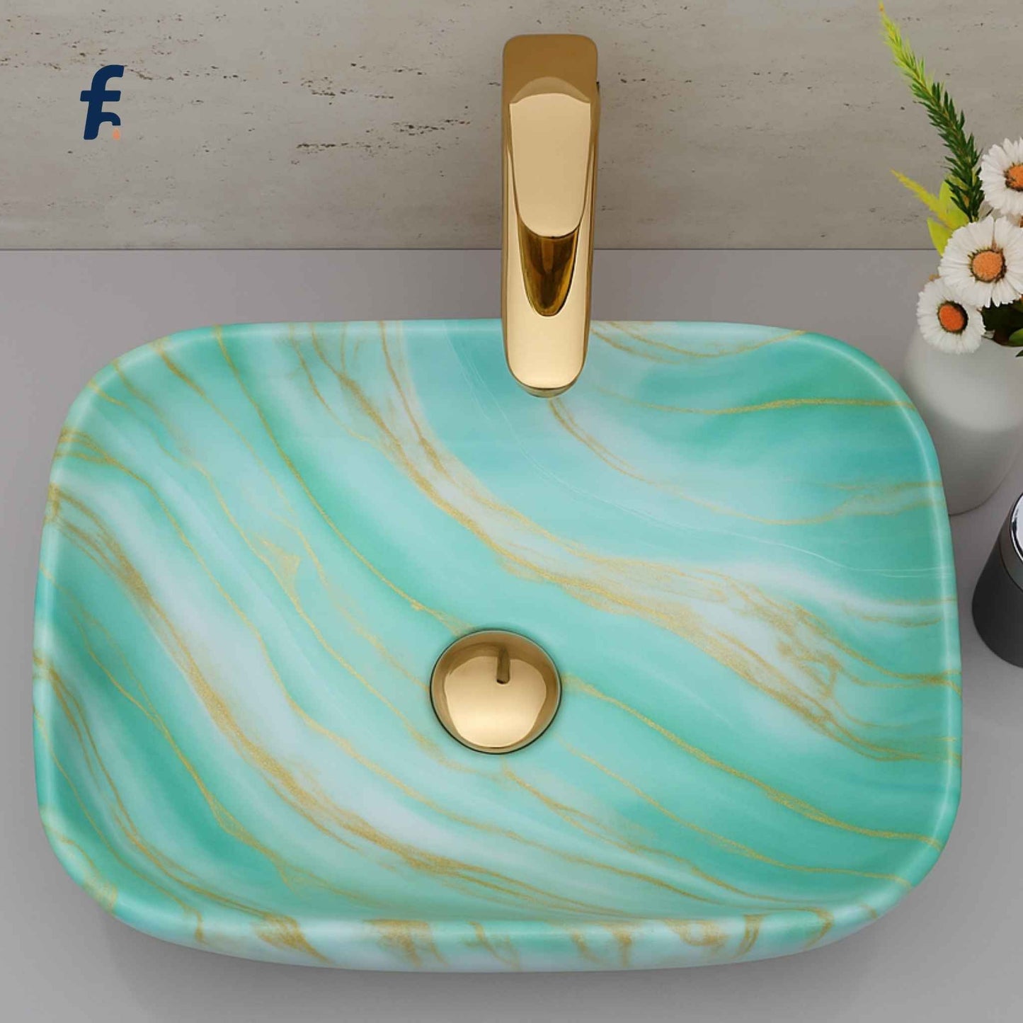 Marble-patterned sink with gold faucet on a light gray background, Top view of green marble rectangular bathroom sink