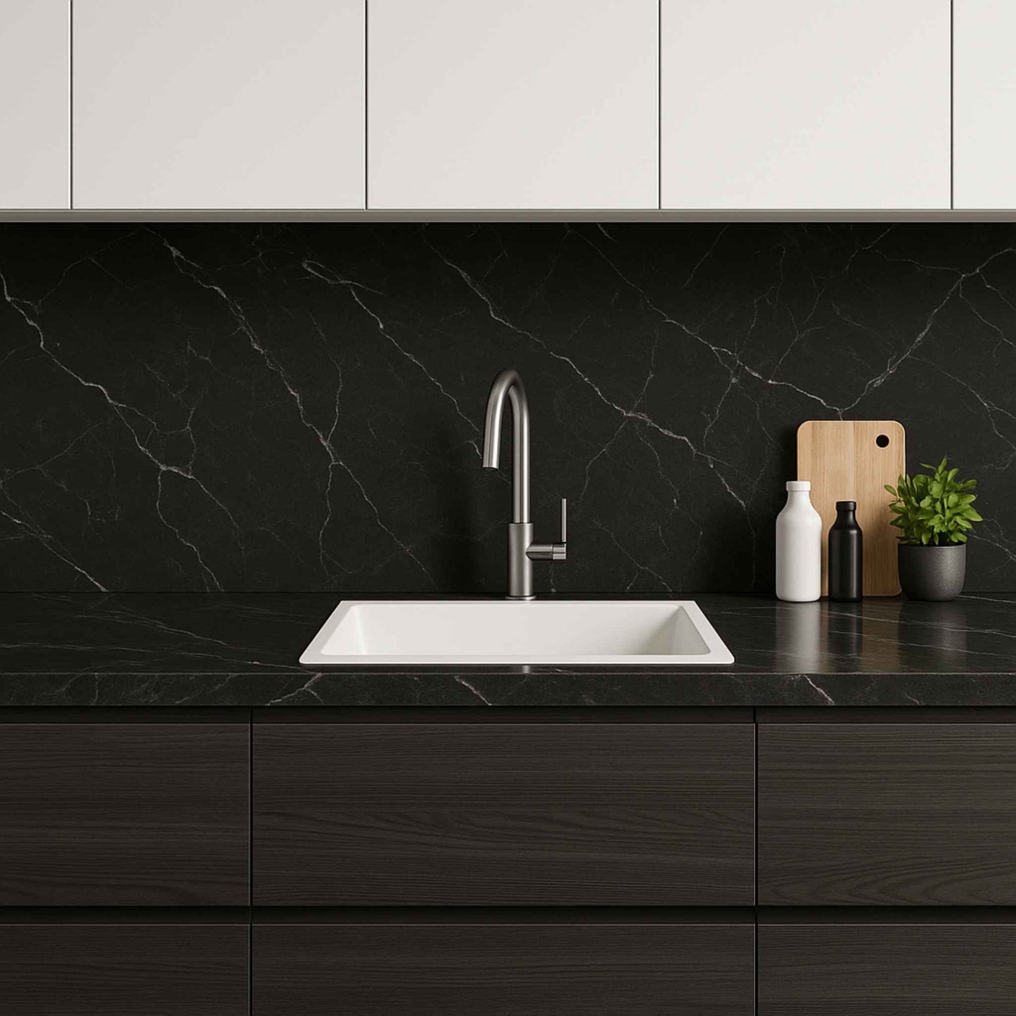 Full view of metallic sink installed in luxury kitchen with dark Calacatta marble top