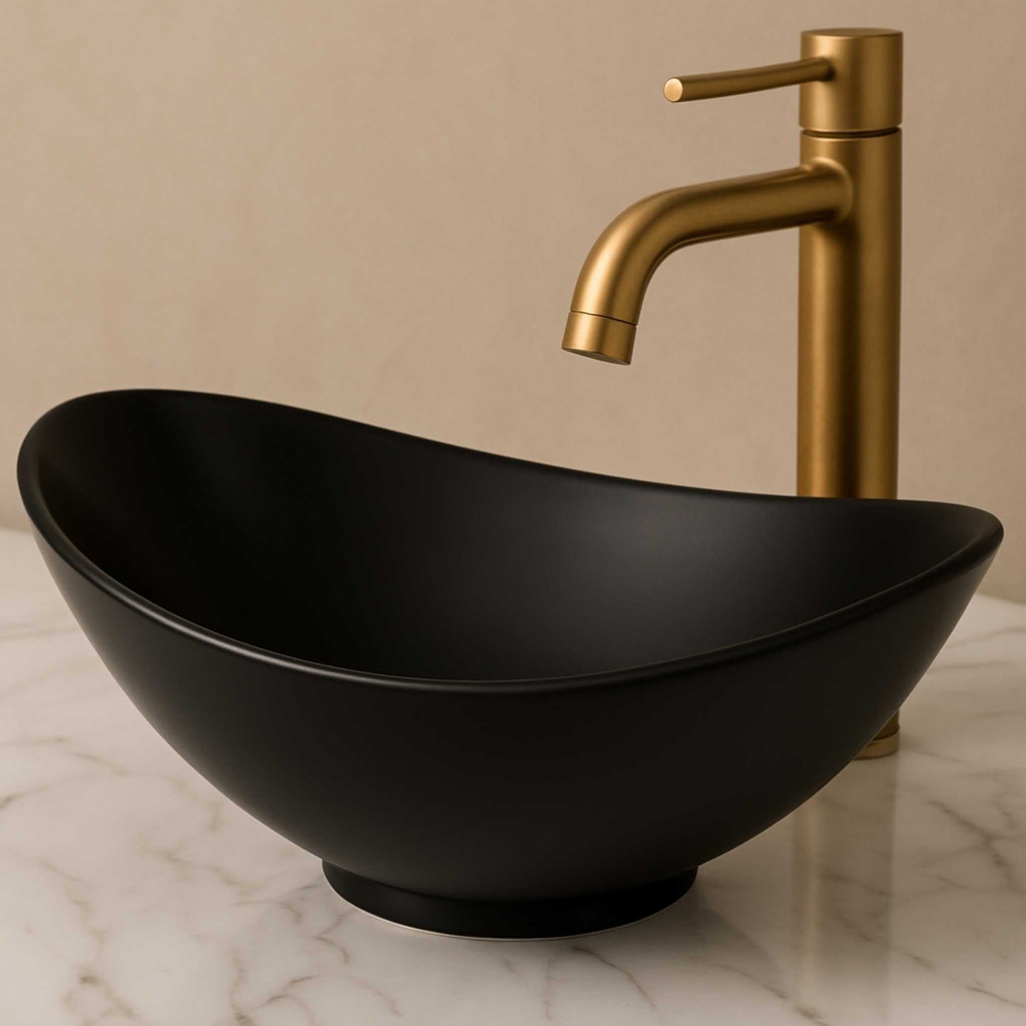 Matte black oval vessel sink on white marble countertop with gold faucet – modern bathroom vanity look