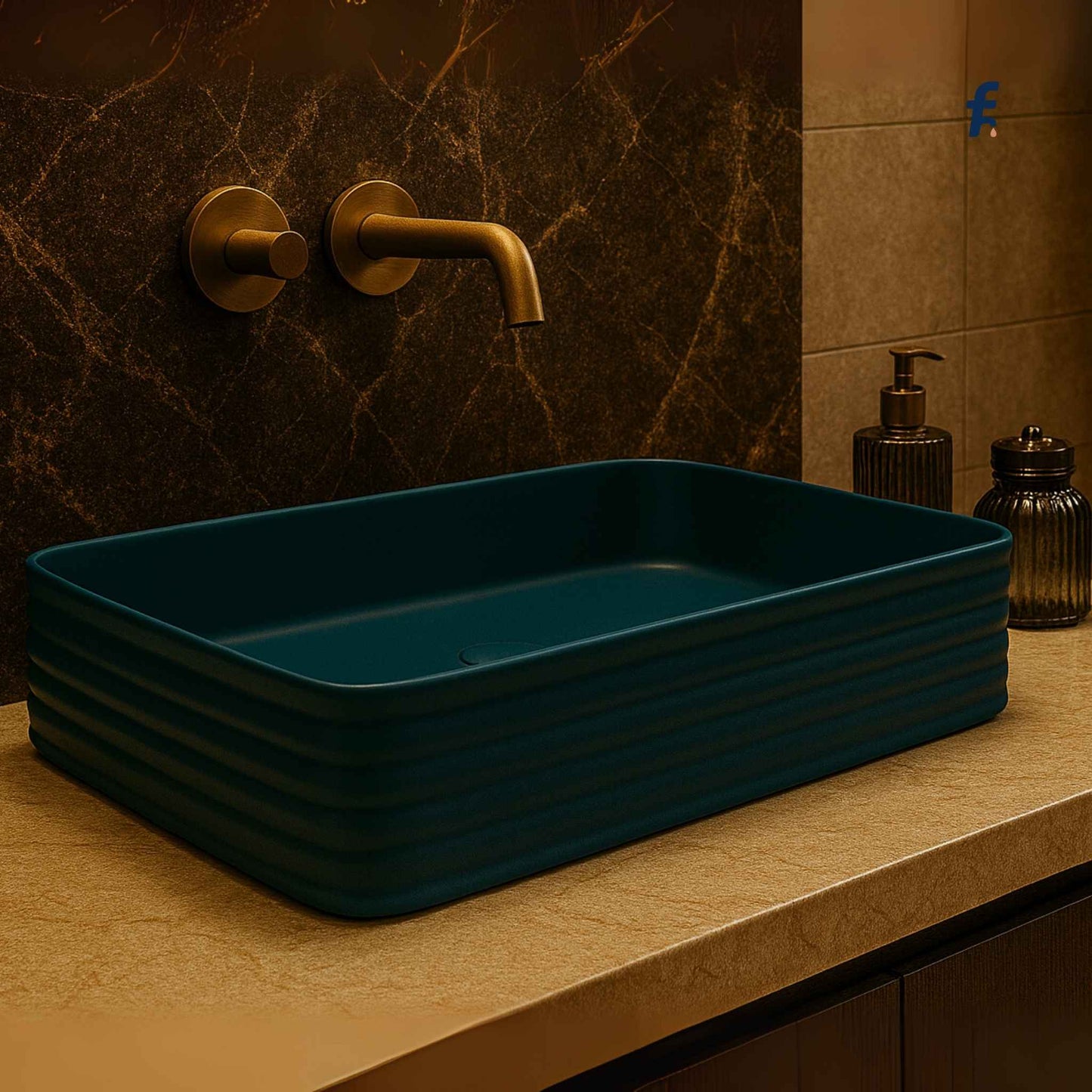 Teal rectangular sink on a bathroom counter with gold faucet and decorative items.