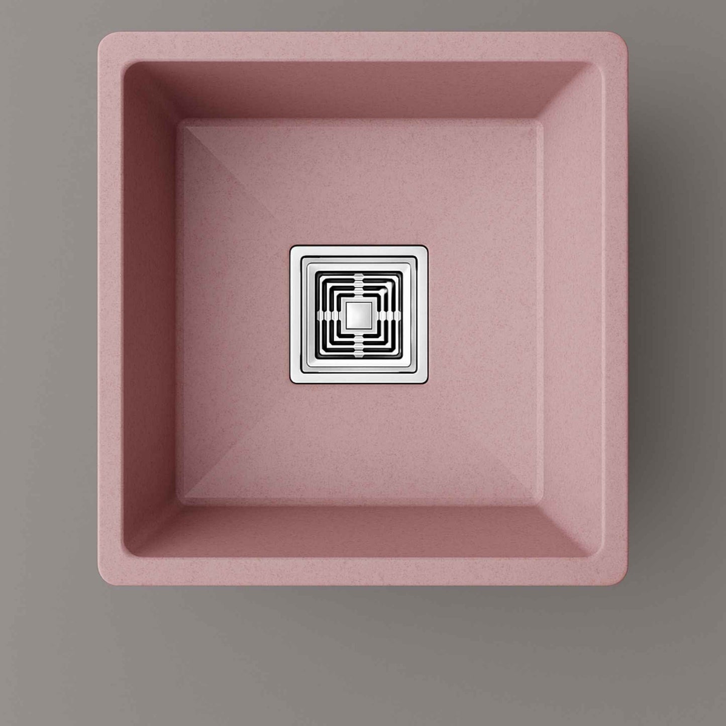 Top view of matte pink quartz granite kitchen sink with sleek stainless steel square drain – 18x16 inches.