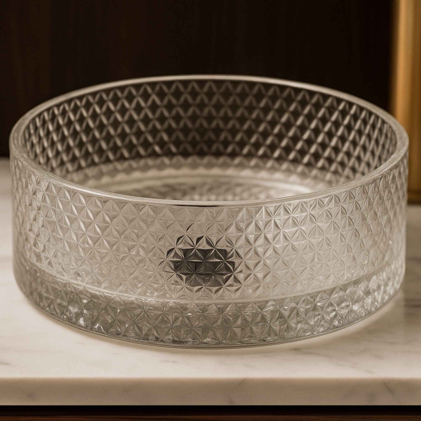 Close-up of designer round textured glass wash basin in luxury vanity