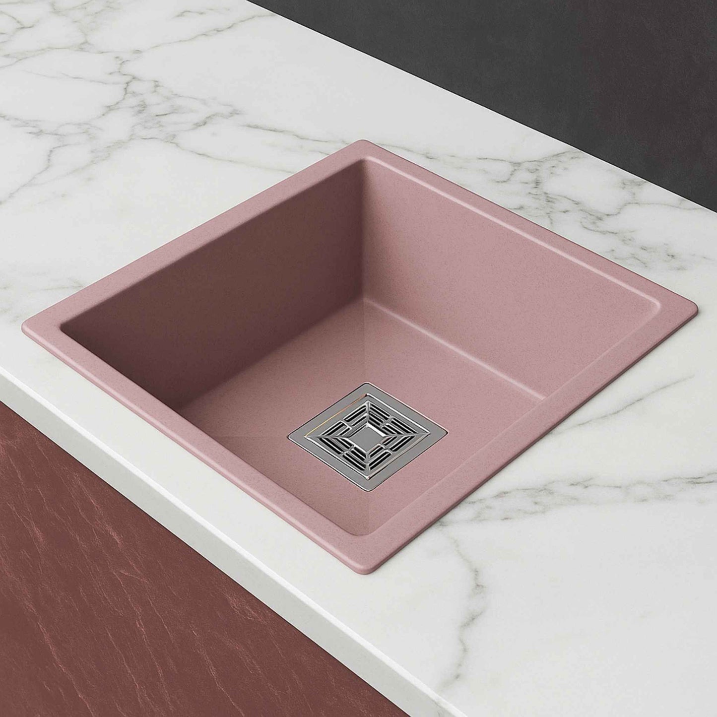 Side angle image of blush rose kitchen sink on designer countertop