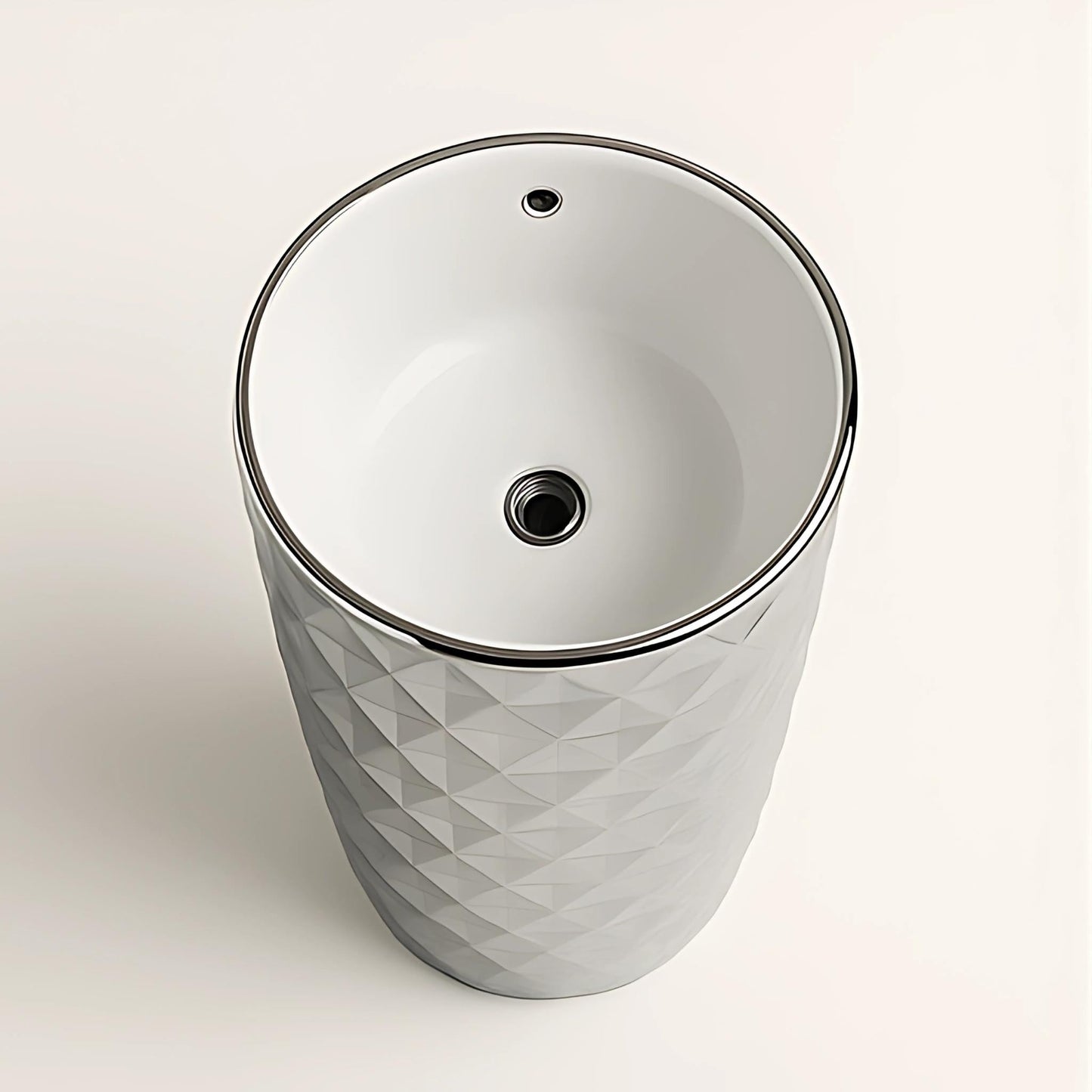 Top view of glossy white ceramic pedestal washbasin in silver finish