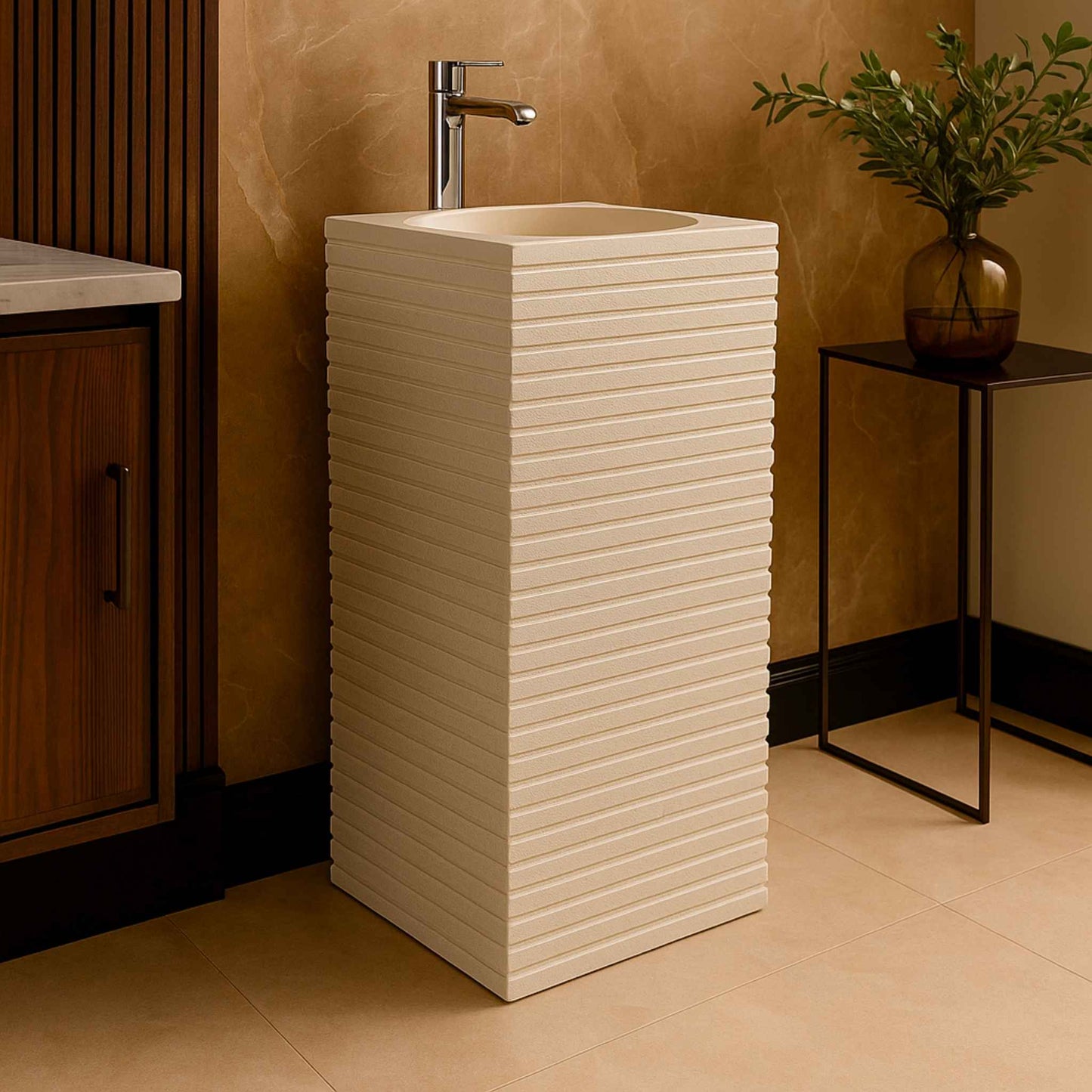 Pedestal basin in modern bathroom with wood vanity and marble wall