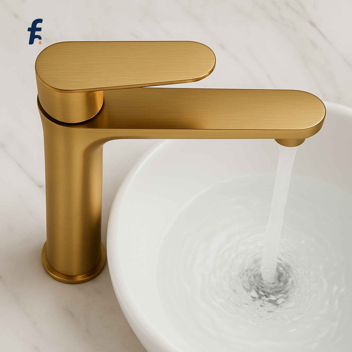 Gold faucet with water flowing into a white sink on a light background